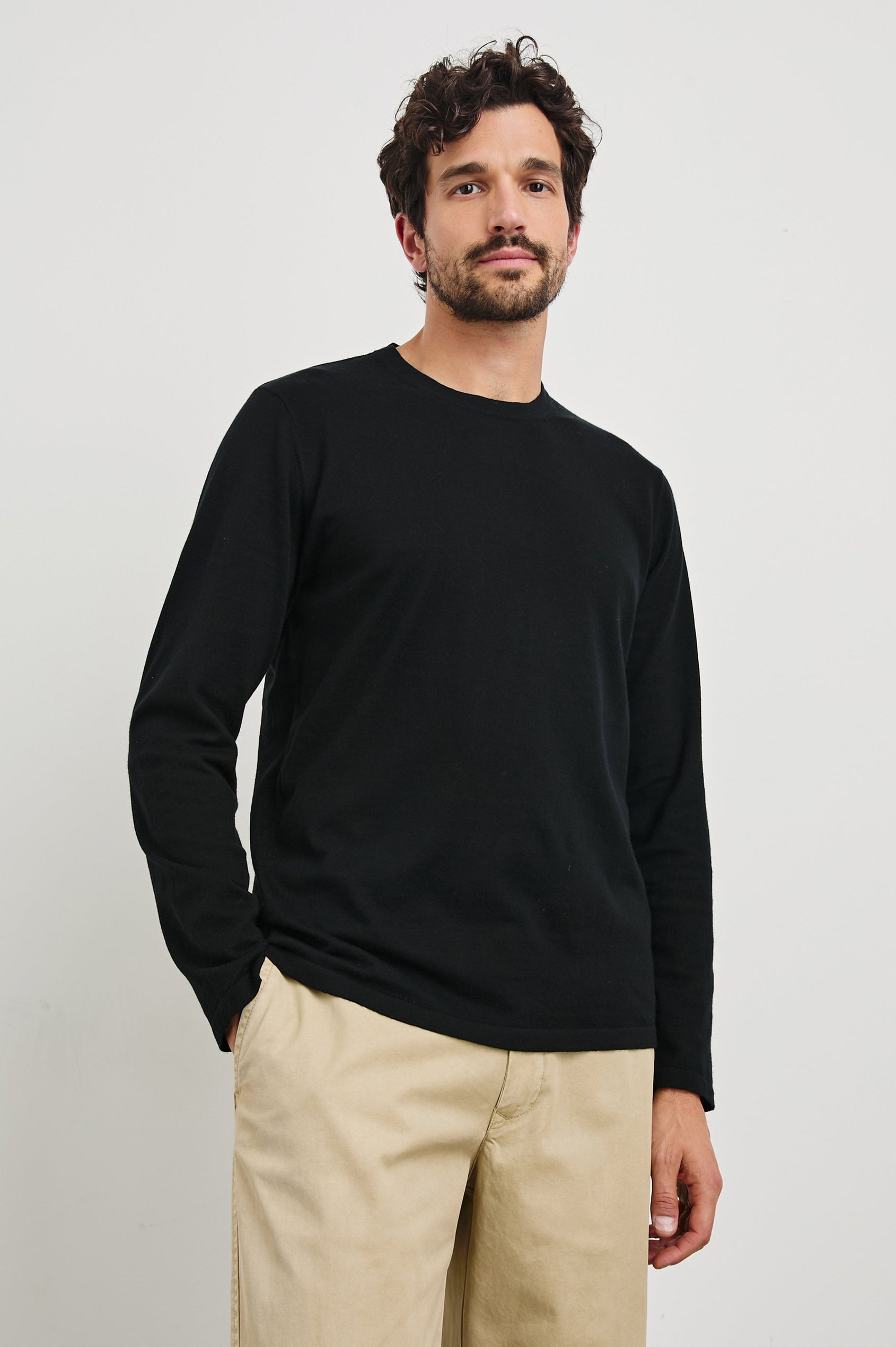 Quentin Cotton Cashmere Long Sleeve Tee with a Crew Neck in Black Colorway - Front View Featured on Model