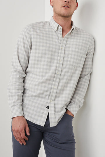 Reid Long-Sleeve Button Up with a Patch Pocket in Alloy White Melange Colorway, a Grey and White plaid - Front View Featured on Model