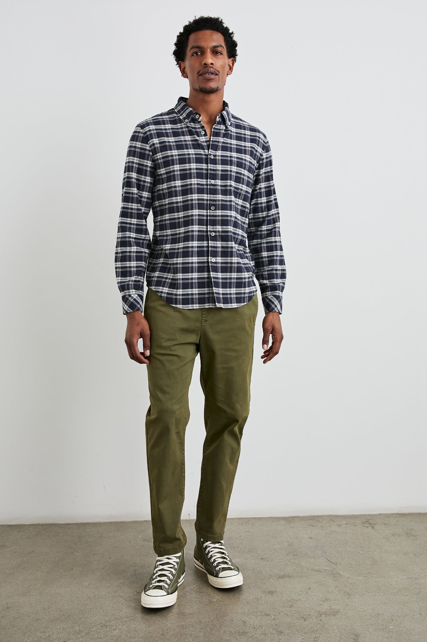 Reid Long-Sleeve Button Up with a Patch Pocket in Navy Lentil Cream Colorway, a Navy, Cream and Brown plaid - Front Full Body View Featured on Model