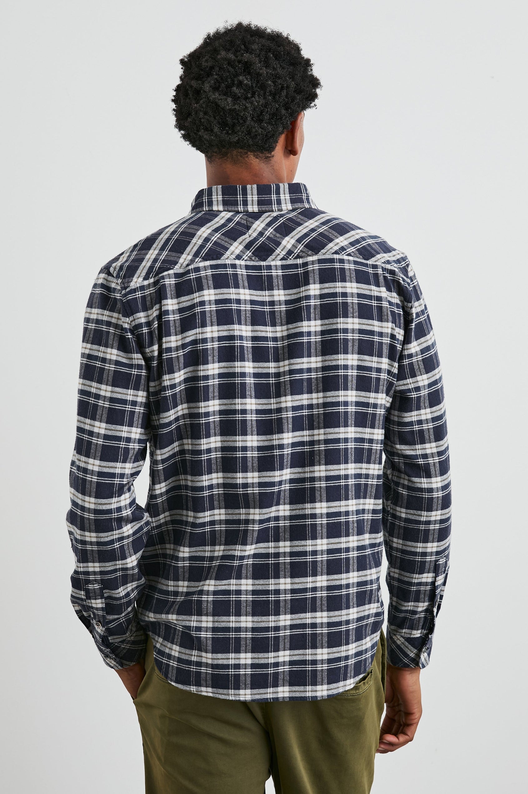 Reid Long-Sleeve Button Up with a Patch Pocket in Navy Lentil Cream Colorway, a Navy, Cream and Brown plaid - Back View Featured on Model