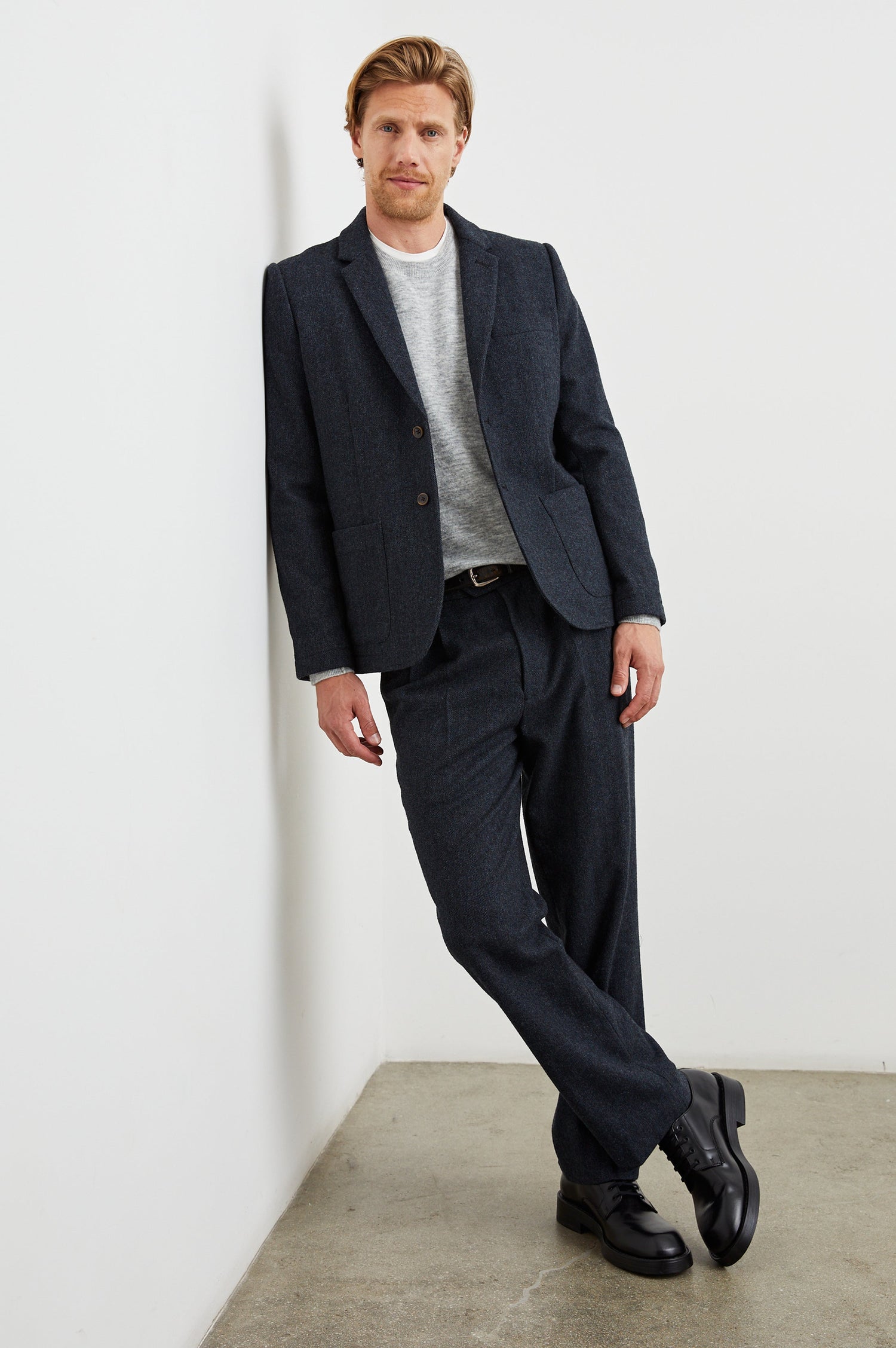 Reynard Blazer with Two Button Closure, Two Front Pockets, a Chest Welt Pocket, Herringbone Fabric in Celestial Tweed Colorway - Front Full Body View Featured on Model