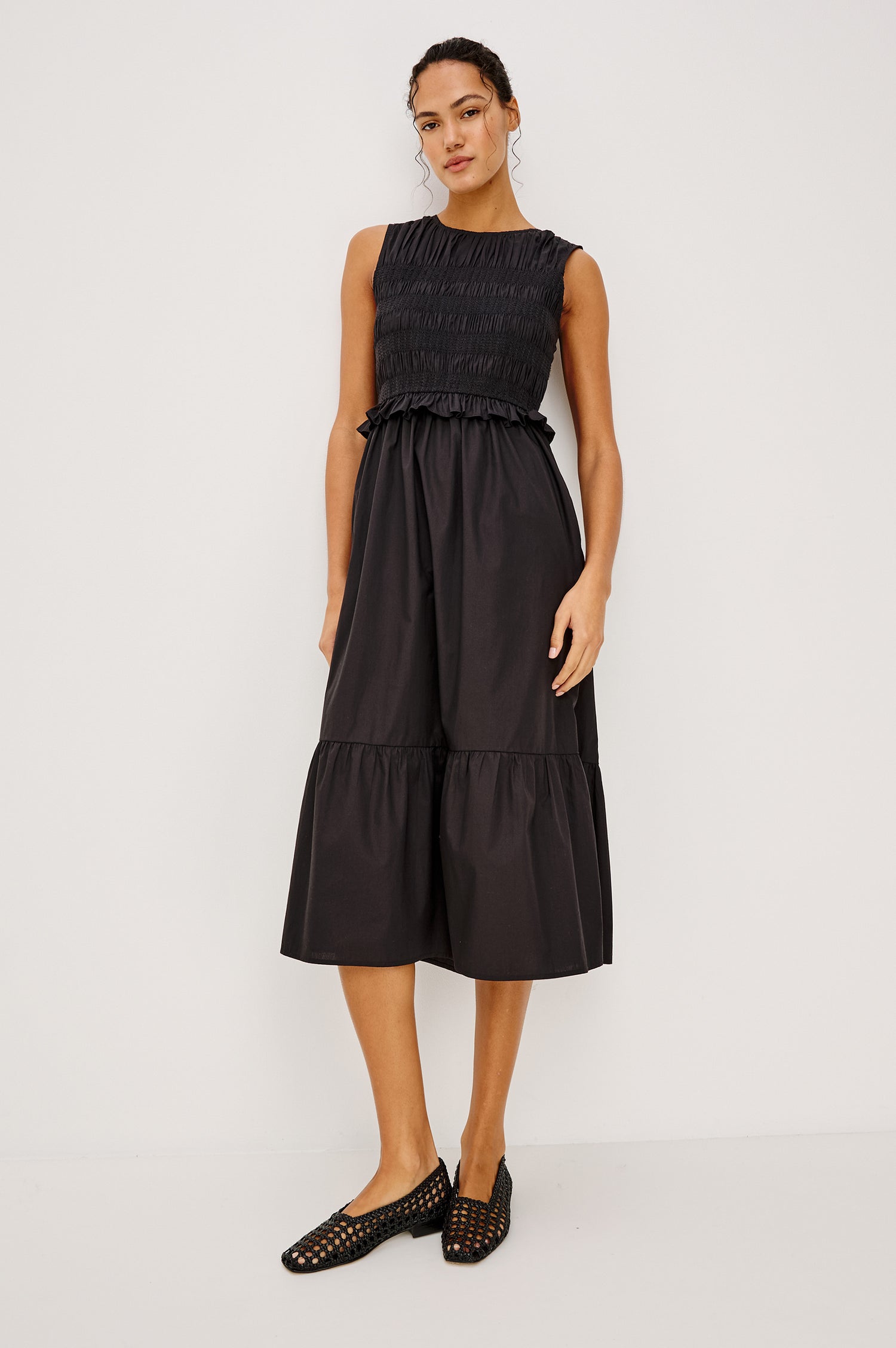 Rialto Midi Dress in Lightly Textured Poplin With Smocked Bodice, Ruffle Trim, Tiered Skirt, and Back Keyhole With Button-and-Loop Closure in Black Colorway - Full Body Front View Featured on Model