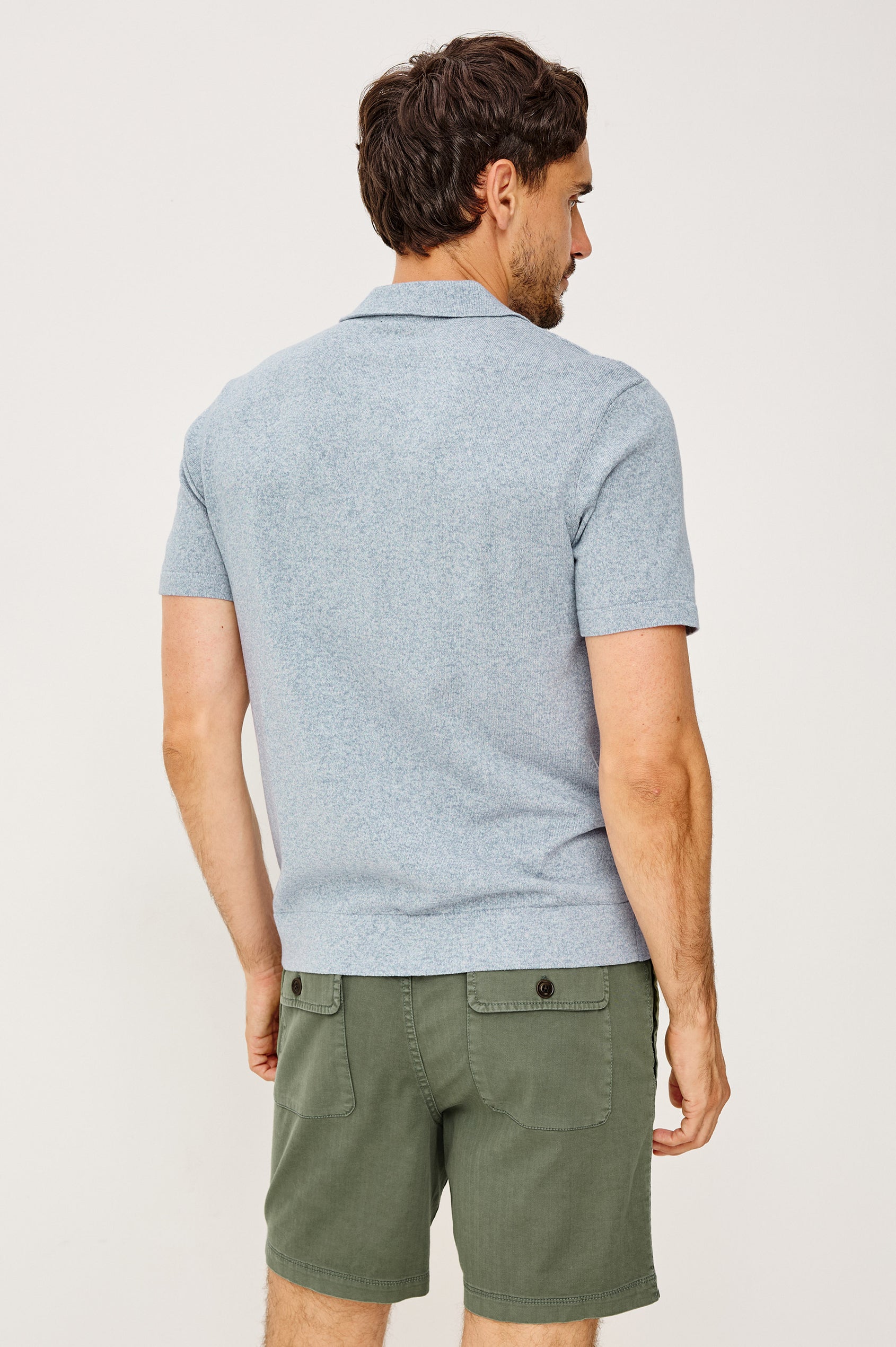 Richie Polo Shirt in Cotton Blend Knit With Collar, Front Buttons, Short Sleeves, and Classic Fit in Navy White Sky Colorway - Upper Body Back View Featured on Model