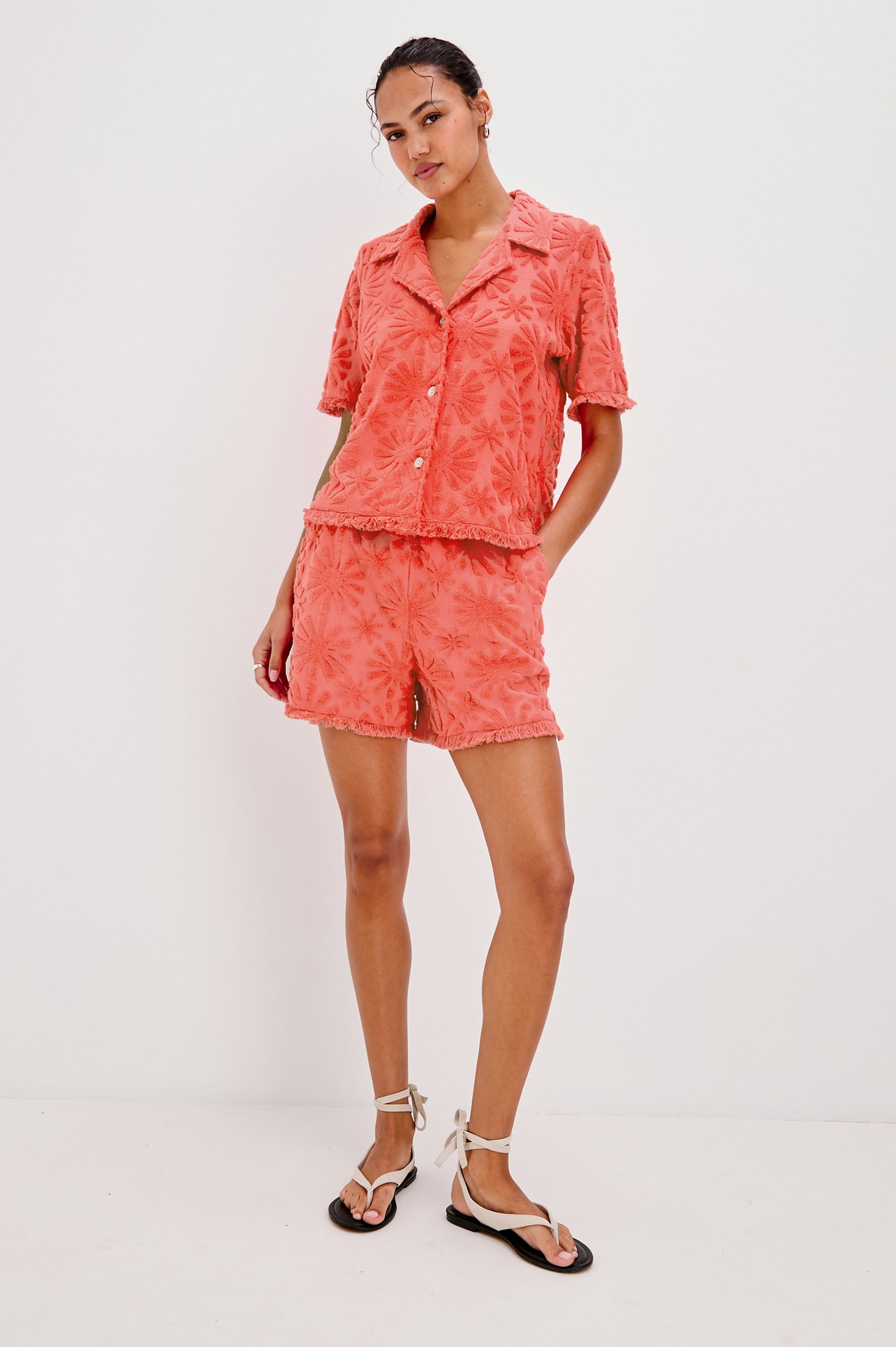 River Pull On Short with Elastic Waistband and Fringe Hem in Red Sunburst Jacquard Colorway. Full Body Front View on Model Shown.