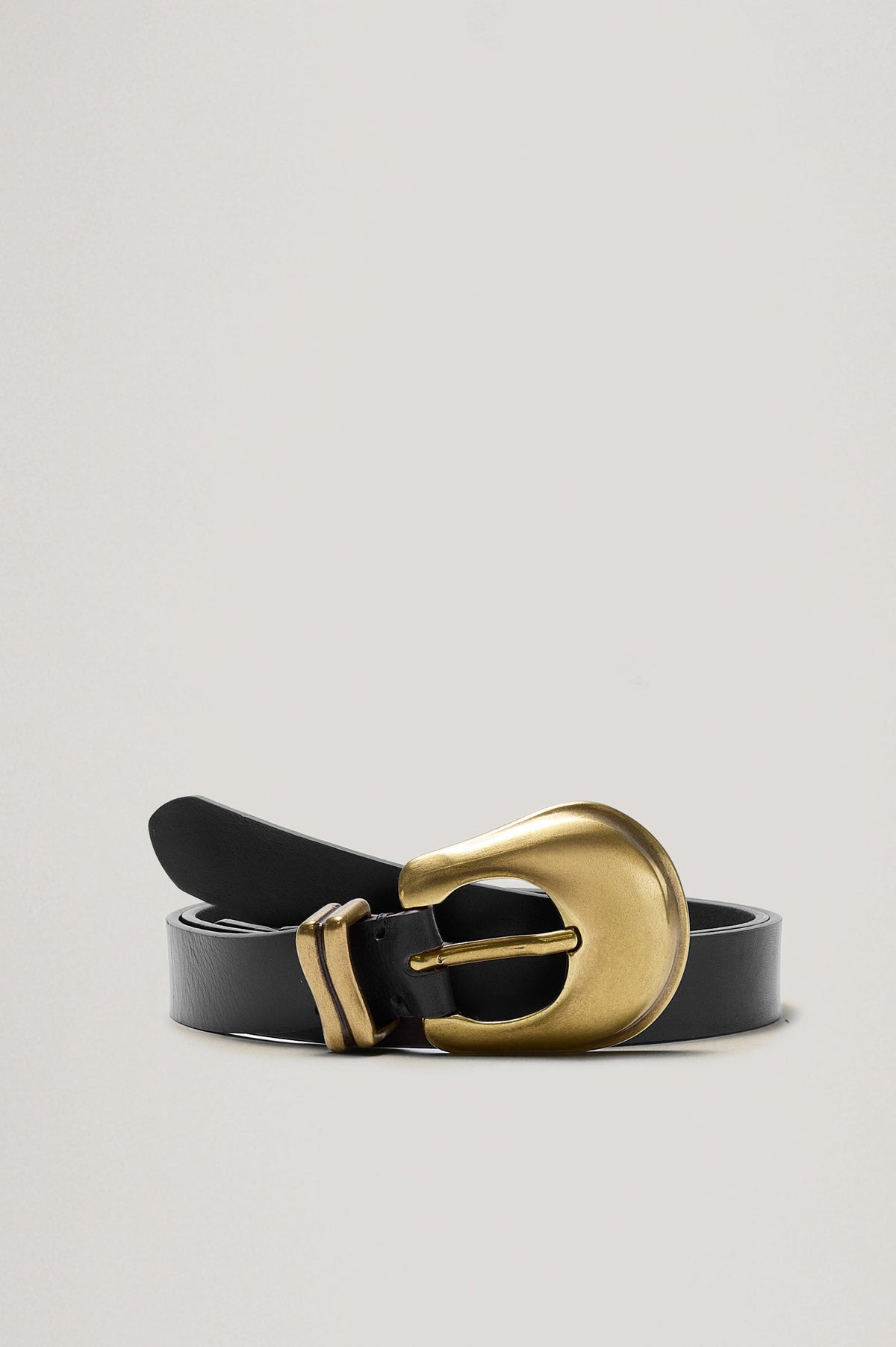 Rodeo black leather belt featuring a western-style engraved gold buckle and hardware. Front view of belt featured not on model.