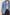 The Rodeo is button front collared denim jacket with side pockets and fringe along front yoke in Indigo Cowboy colorway, a medium blue wash. Front detail view featured on model.