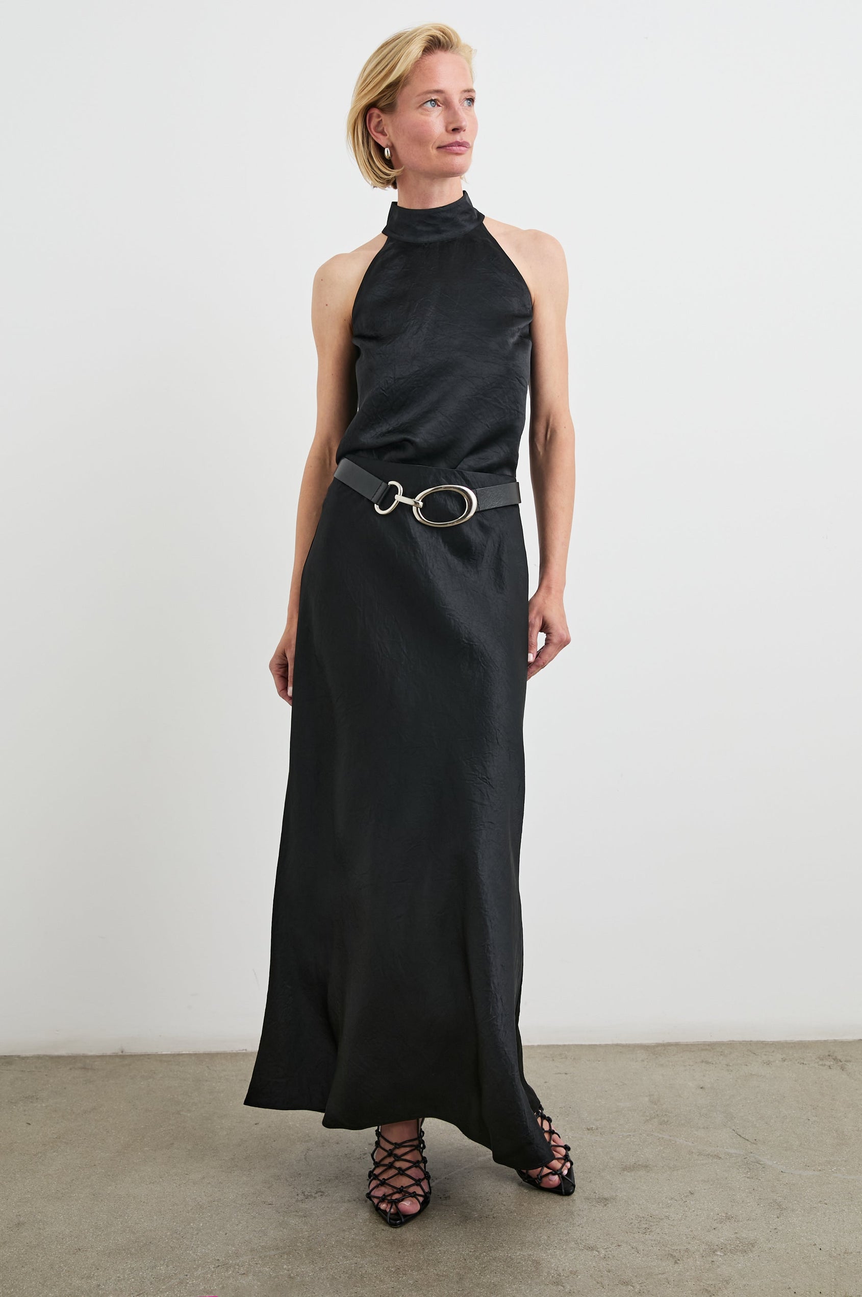Romina Maxi Skirt in Black Crinkle Colorway - Front Full Body View Featured on Model