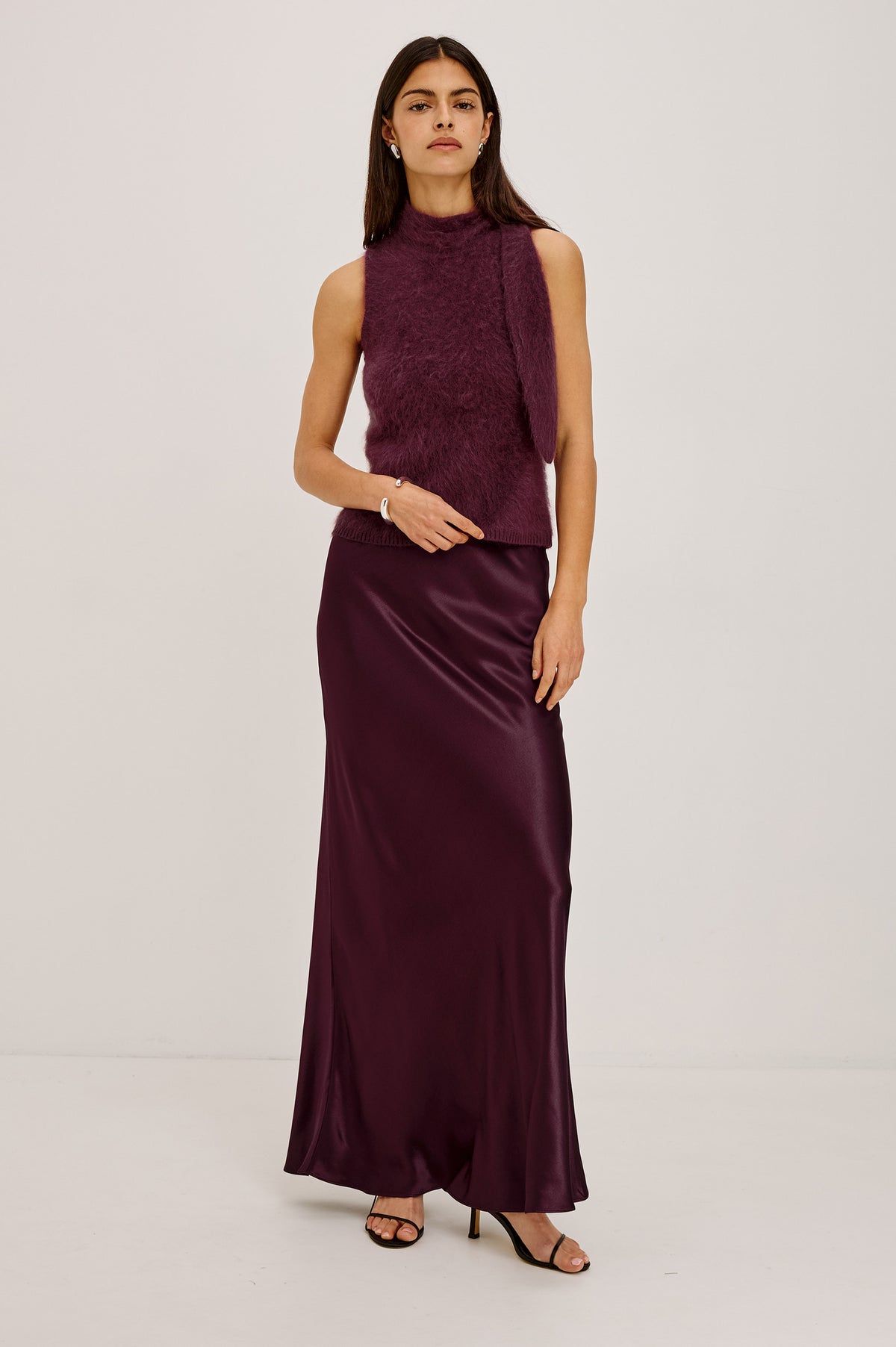 Romina Maxi Skirt Bias Cut in Satin-Back Crepe With Elastic High Waist in Wine Colorway - Upper Body Front View Featured on Model.