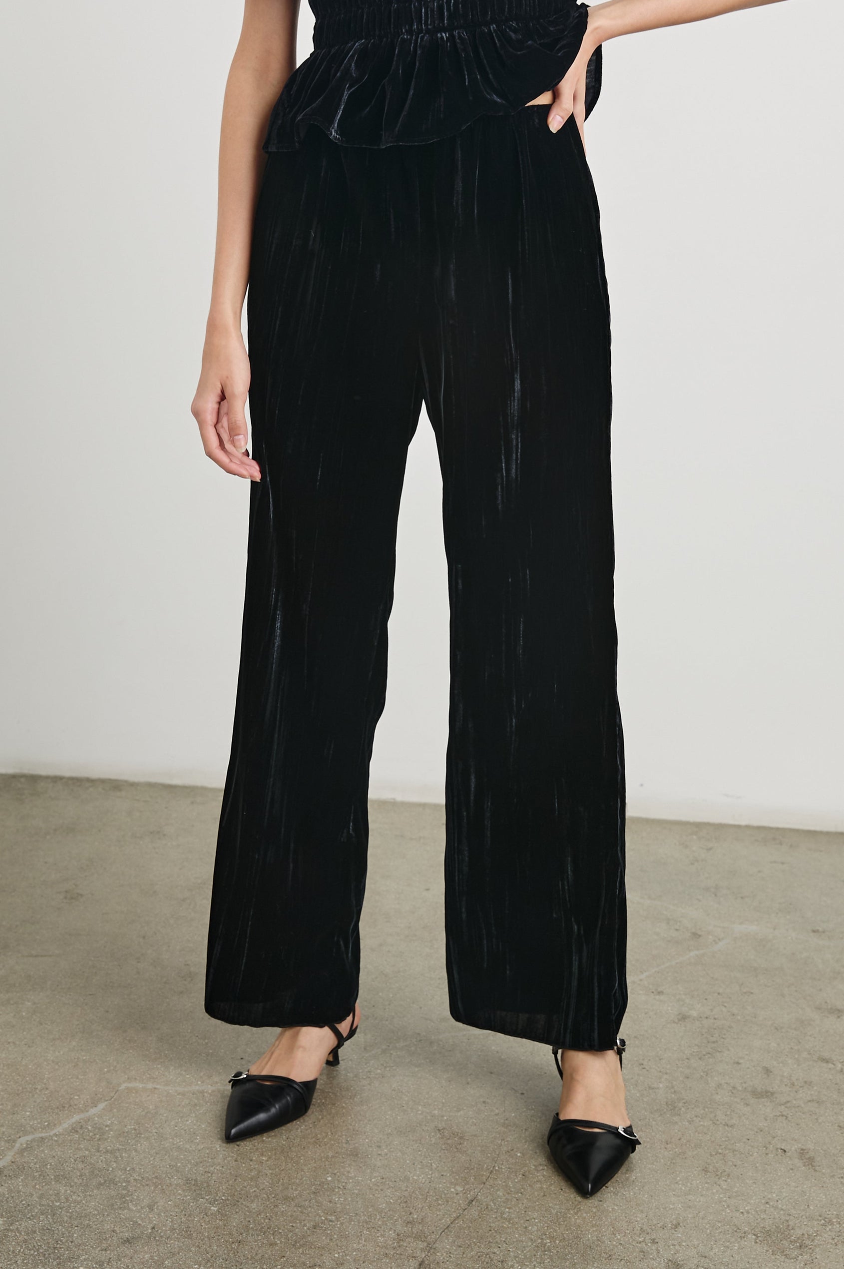 Brissa Pants with an Elastic Waist in Black Velvet Colorway - Front View Featured on Model