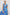 Roxanne A-Line Midi Dress with Smocked Waist, V-Neck, Cap Sleeve and Side Pockets in Blue Riviera Colorway. Front View Shown on Model.