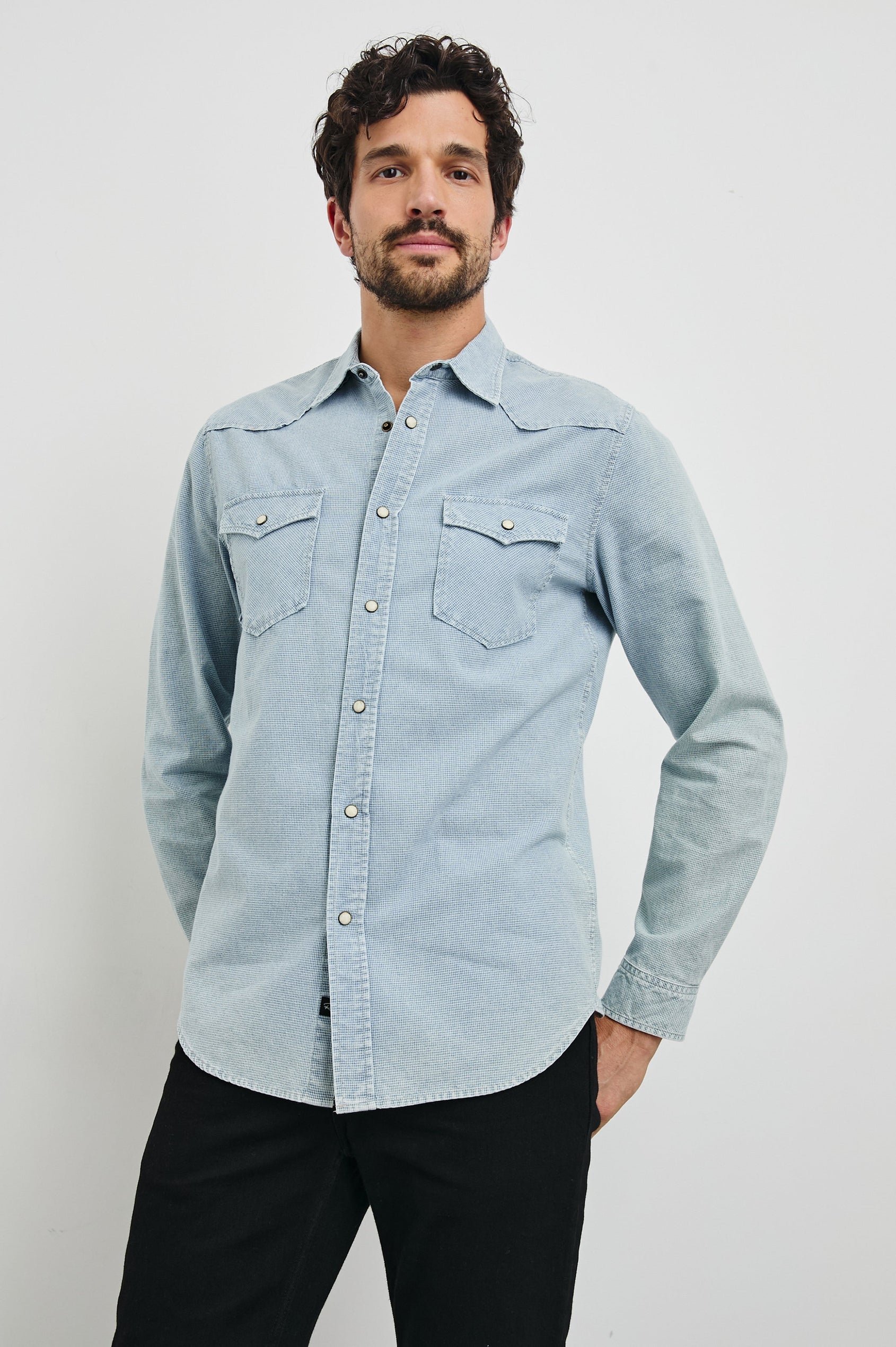 Roy Long-Sleeve with Snap Closure, Two Chest Snap Flap Pockets and Traditional Western Yokes in Sunfaded Indigo Colorway - Front View Featured on Model   