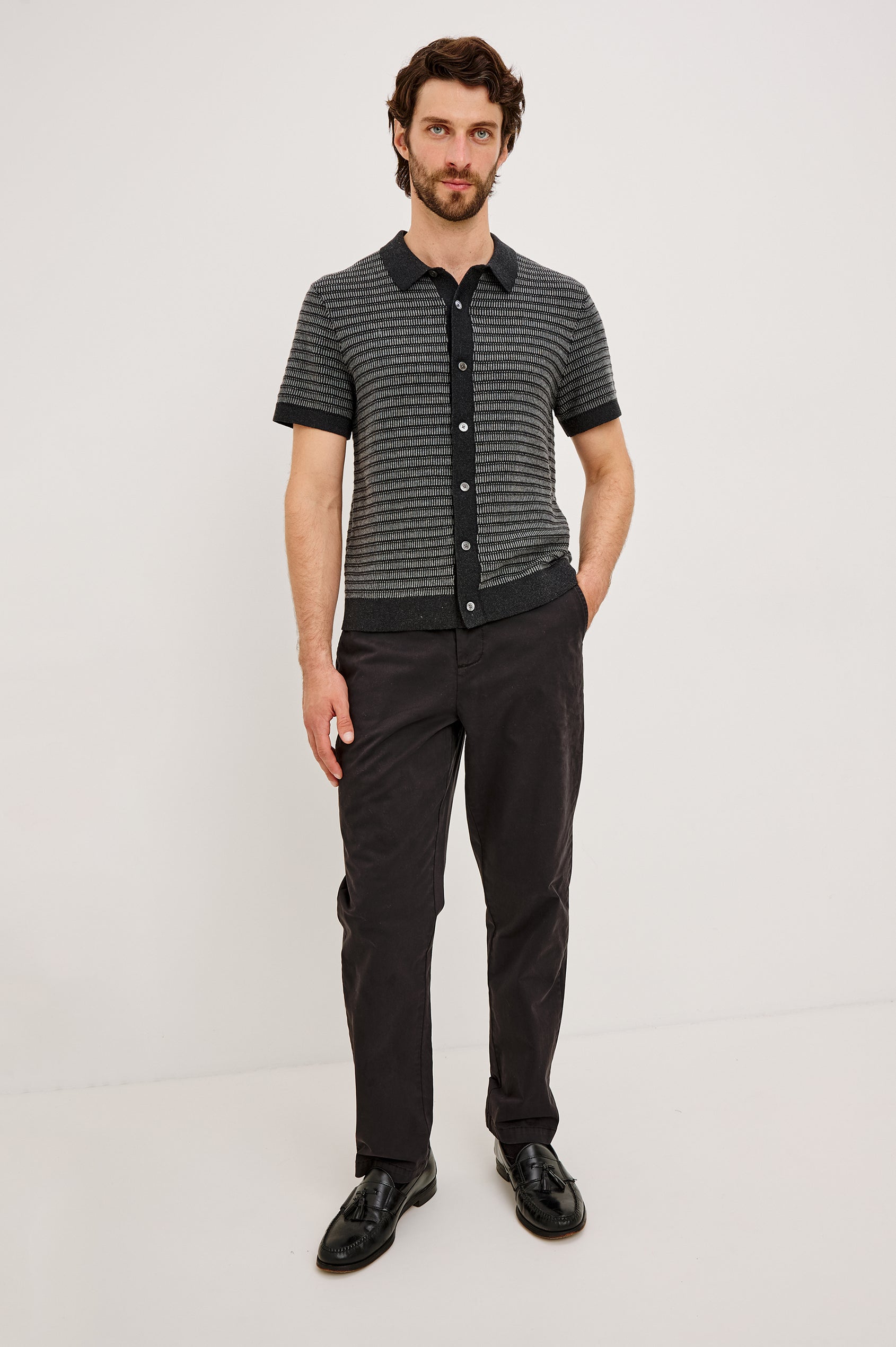 Rubin Shirt in Cotton Knit WIth Short Sleeves, Full Button Placket, Ribbed Collar, and Tonal Texture in Charcoal Black Stripe Colorway - Full Body Front View Featured on Model