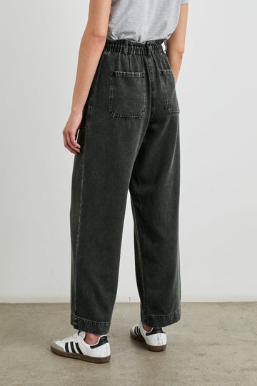 Ryan Pants with a Corded Drawstring Waist, Large Front Pockets and two Back Pockets in Faded Black Colorway - Back View Featured on Model