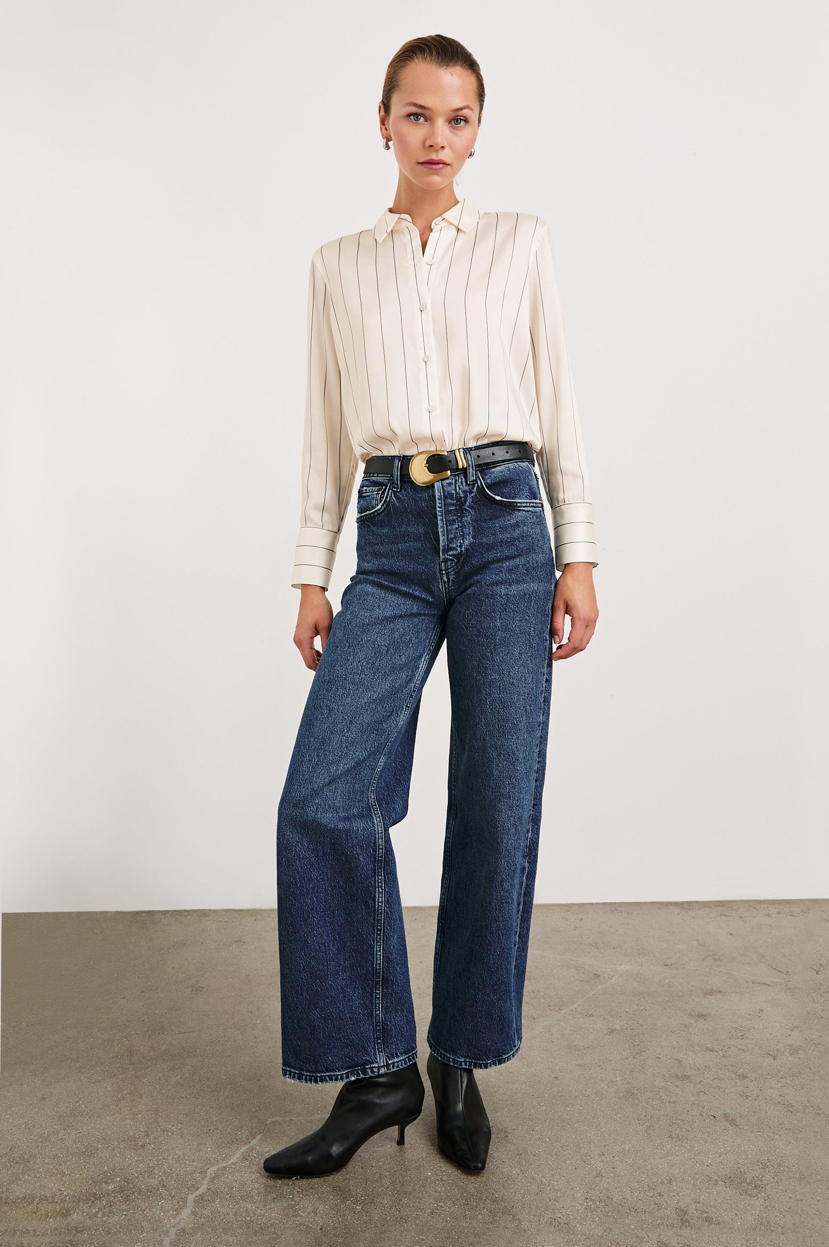 Saige Long-Sleeve Button Up in Brixton Stripe Colorway, Thin Black Stripes on Cream - Front Full Body View Featured on Model