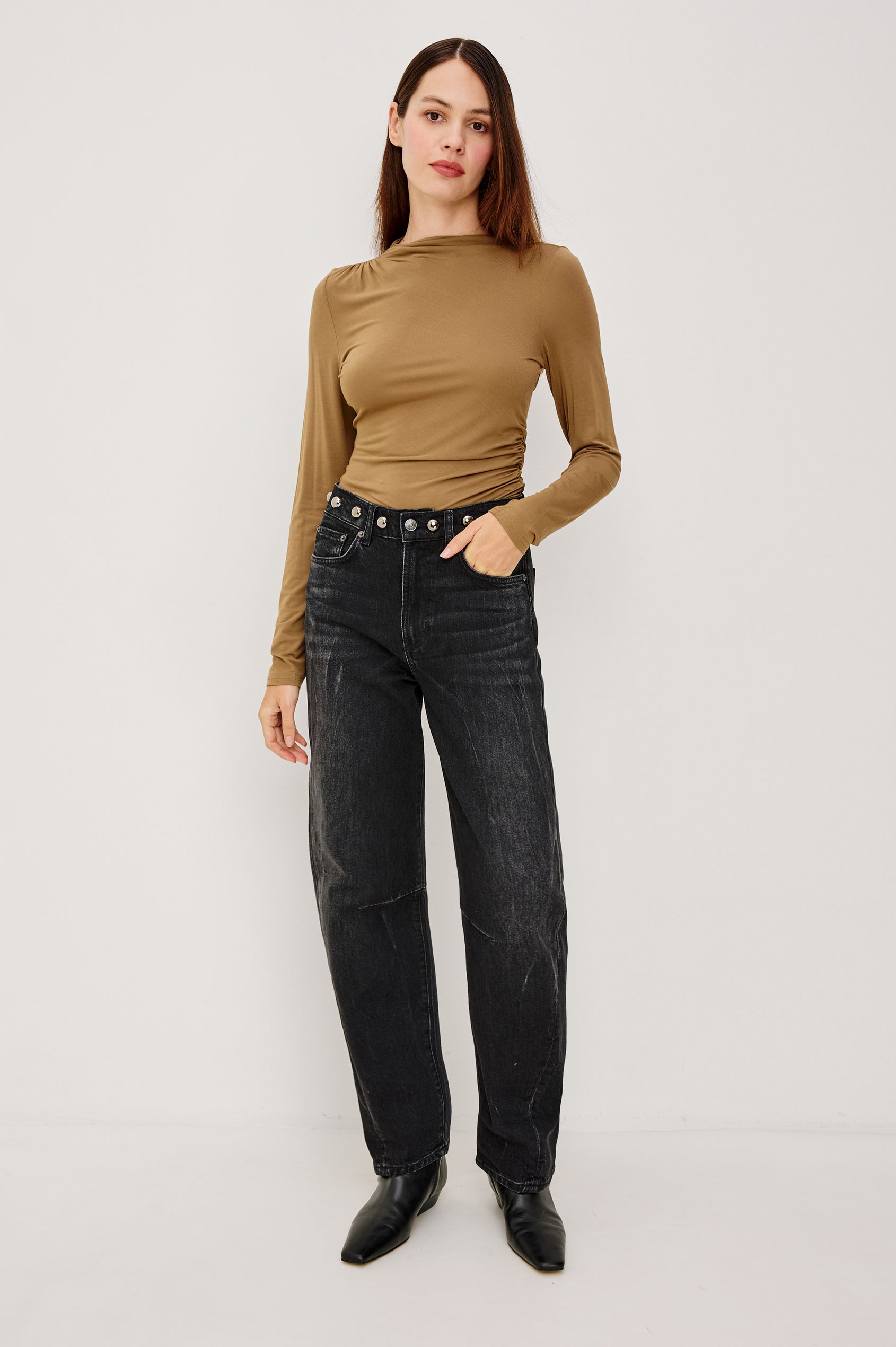 Samo Barrel Jean in Subtle Stretch Denim With Metallic Nail-Back Studs at Waist, 5-Pockets, and Front Zip-Fly in Black Stone Studded Colorway - Full Body Front View Featured on Model