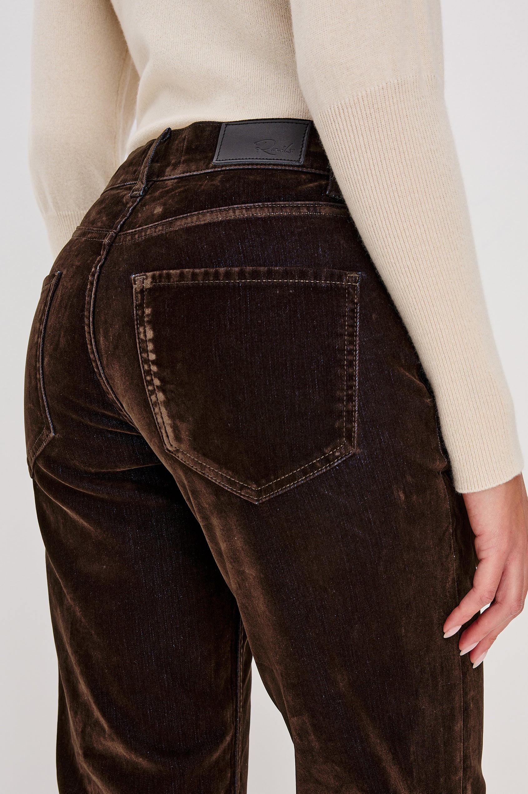 Sepulveda Mid-Rise Jean in Chocolate Flocked Indigo Denim With Relaxed Straight Legs, 5-Pocket Styling, Front Zip-Fly in Chocolate Flocking Colorway - Lower Body Back Close Up View Featured on Model