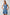 Serra fitted v-neck denim mini dress with pleated skirt in light wash Bristol - front view on model, hands on hips