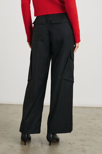 Sienna Pants with Belt Loops, Two Front Pockets, Two Side Patch Flap Pockets and Two Back Flap Patch Pockets in Black Colorway - Back View Featured on Model