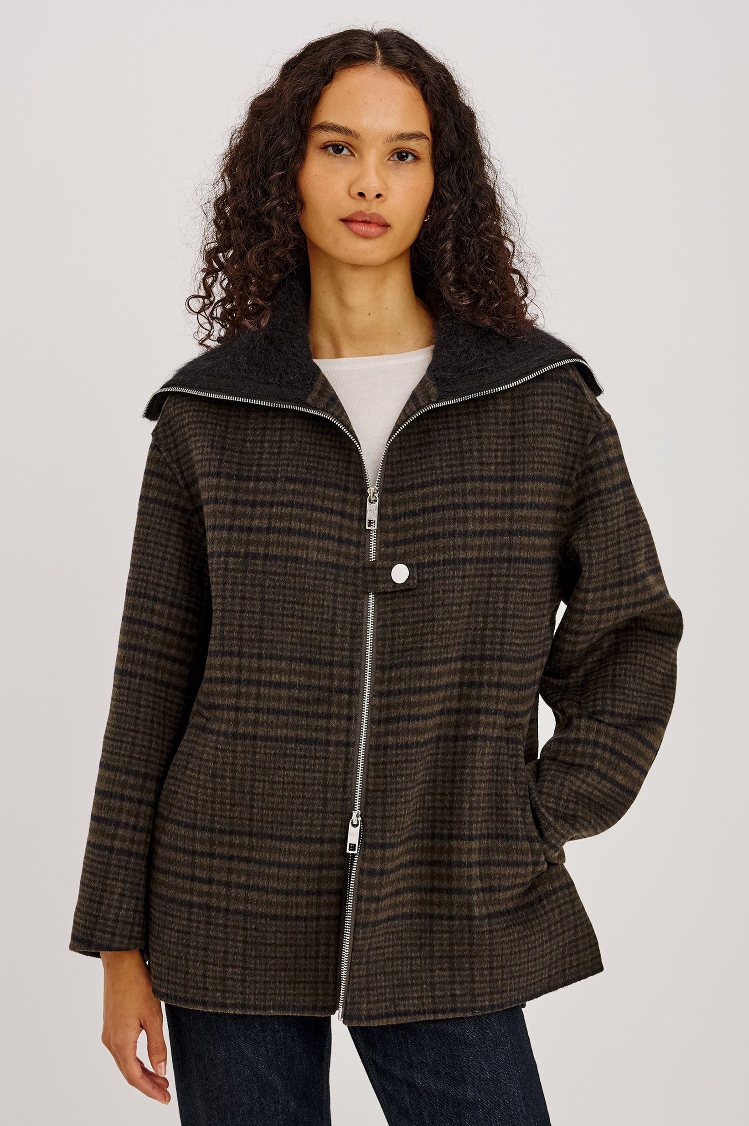 Silves Jacket in Heavy Wool Blend With Contrast Brushed Shawl Collar, Two-Way Front Zip, Single Snap Button, Long Sleeves, and Side Pockets in Highland Plaid Colorway - Upper Body Front View Featured on Model