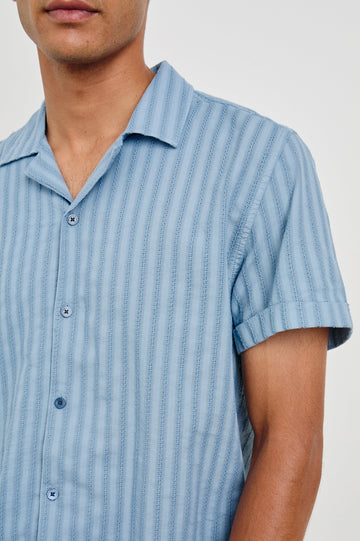 Sinclair short sleeve button up shirt with camp collar in Faded Blue with stripes - close up of details on model