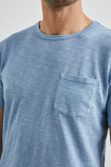 Skipper Short-Sleeve T-shirt with a Crew Neck and a Chest Patch Pocket in Celsius Colorway, a Blue - Front View Featured on Model
