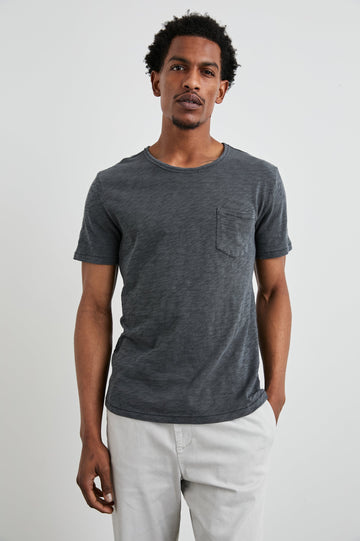 Skipper Short-Sleeve T-shirt with a Crew Neck and a Chest Patch Pocket in Faded Navy Colorway - Front View Featured on Model