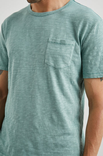 Skipper Short-Sleeve T-shirt with a Crew Neck and a Chest Patch Pocket in Jade Colorway - Front View Featured on Model