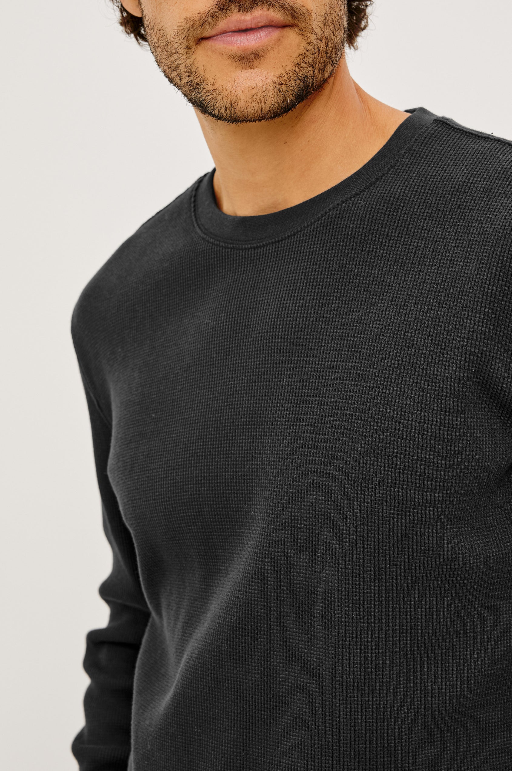 Smith Thermal in Micro-Waflle Cotton Knit With Ribbed Crew Neckline and Cuffs, and Long Sleeves in Onyx Colorway - Upper Body Front View Featured on Model