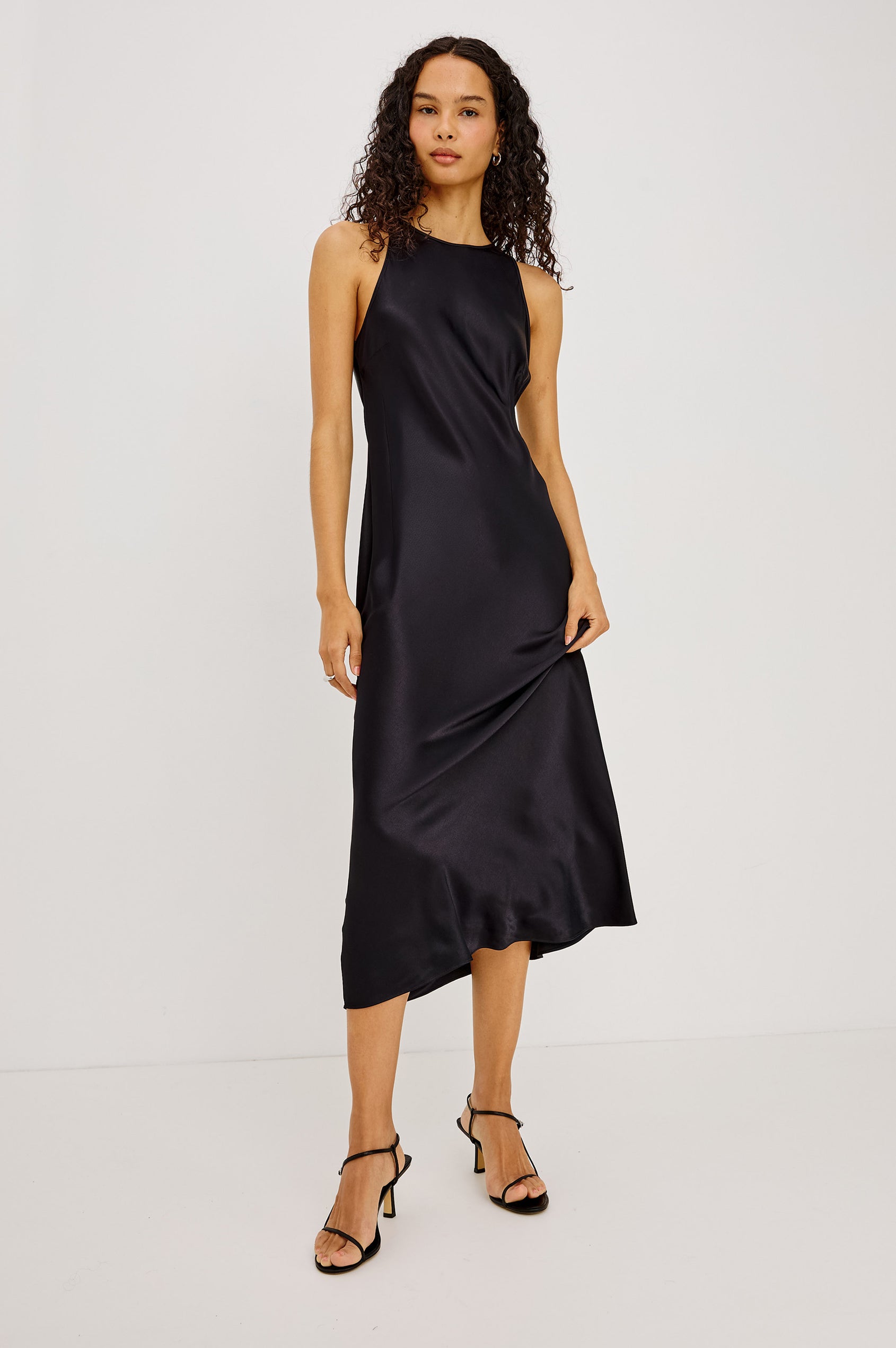 Solene Midi Dress in Satin-Back Crepe With Jewel Neck, and Back Keyhole With Self-Tie in Black Colorway - Full Body Front View Featured on Model