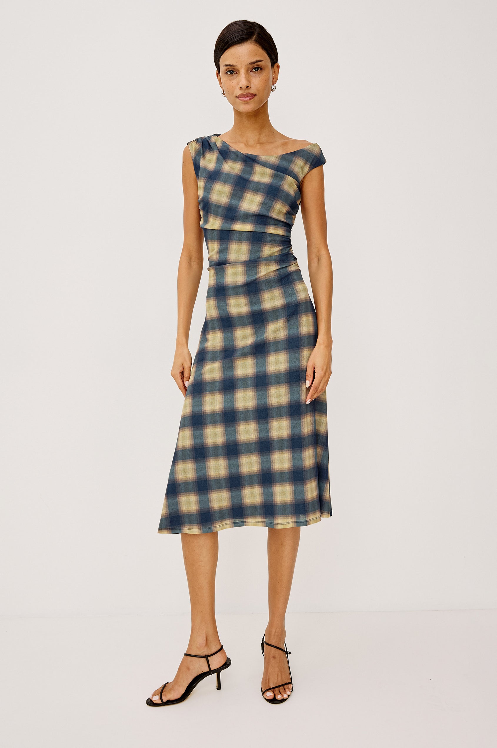 Sorra Midi Dress in Self-Lined Mesh With Asymmetrrical Neckline, Shirred Shoulder Strap, Side Waist Ruching, Bias-Cut Skirt in Navy Sage Plaid Colorway - Full Body Front View Featured on Model