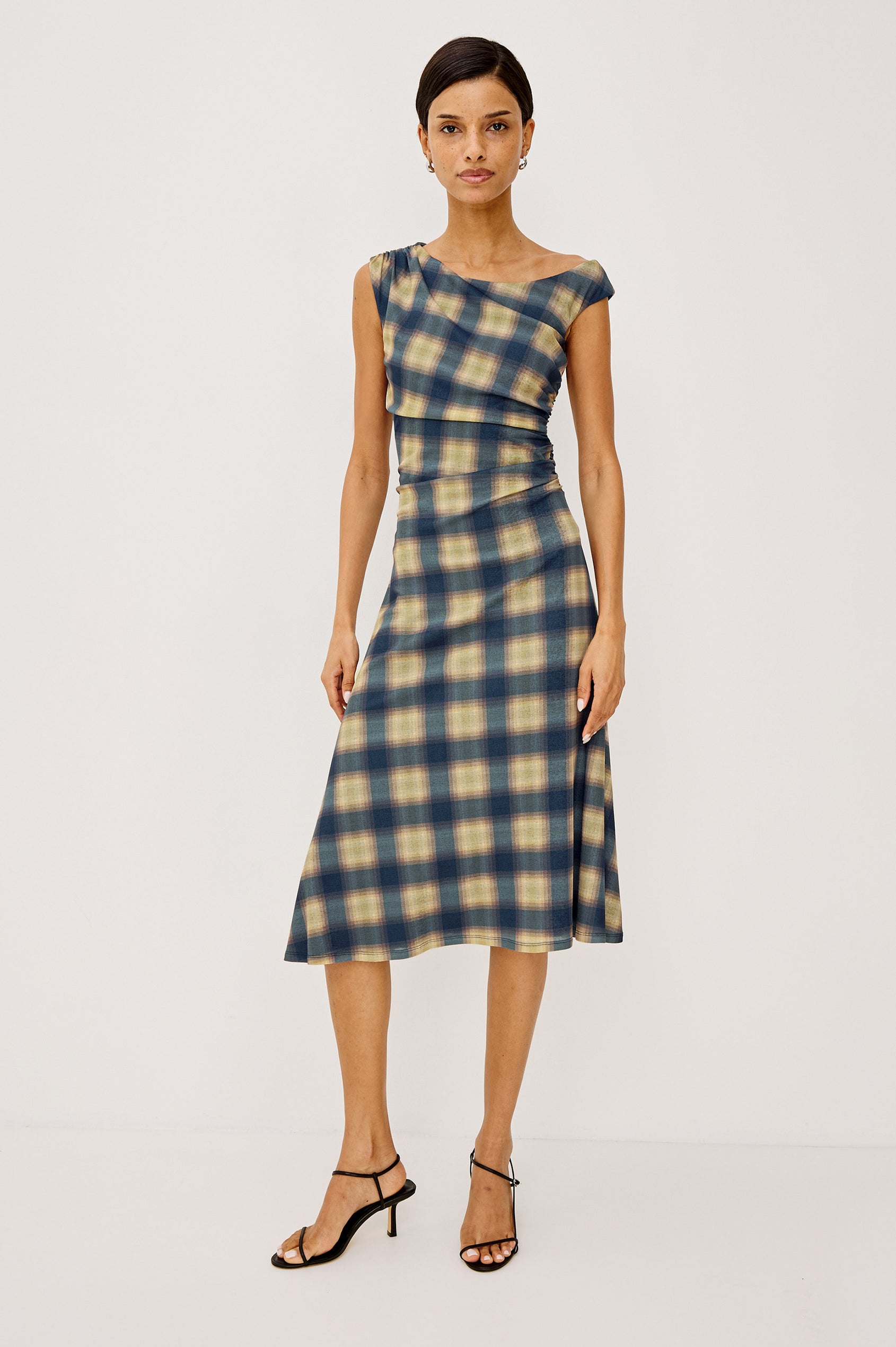 Sorra Midi Dress in Self-Lined Mesh With Asymmetrrical Neckline, Shirred Shoulder Strap, Side Waist Ruching, Bias-Cut Skirt in Navy Sage Plaid Colorway - Full Body Front View Featured on Model