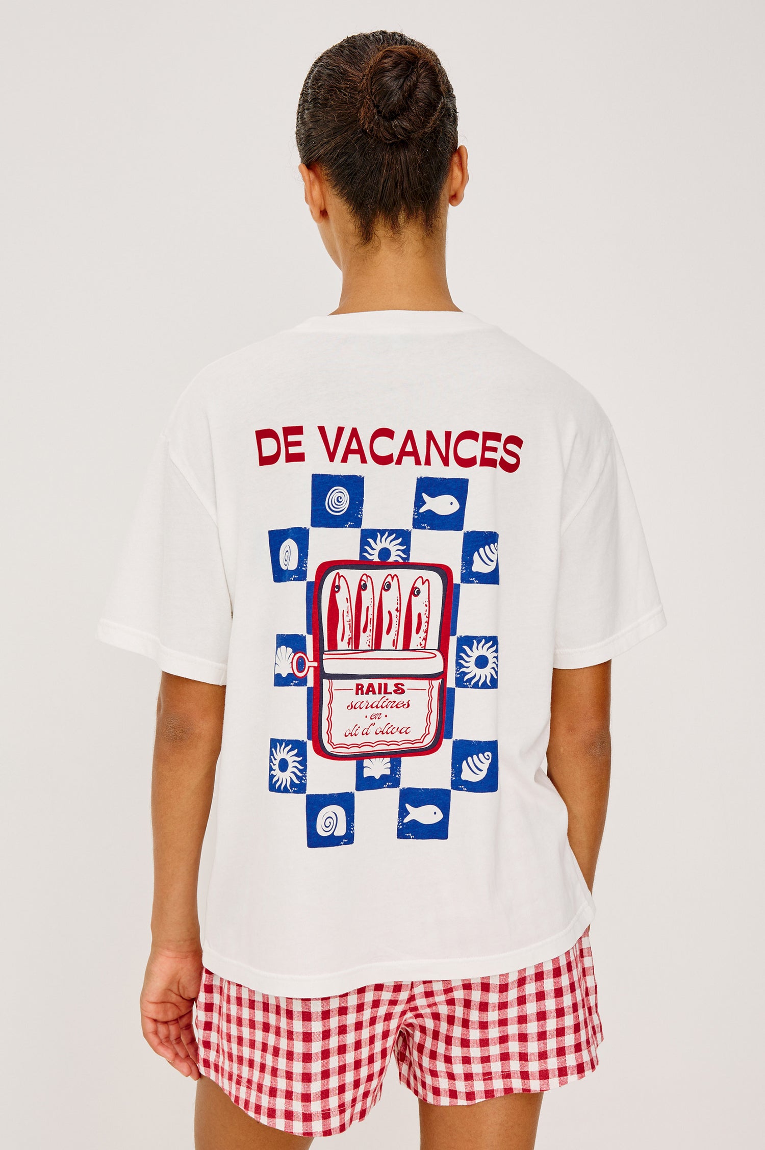 Souvenir Tee in Vintage Cotton With Crew Neckline, Loose Fit, and Short Sleeves in Sardines Colorway - Upper Body Back View Featured on Model