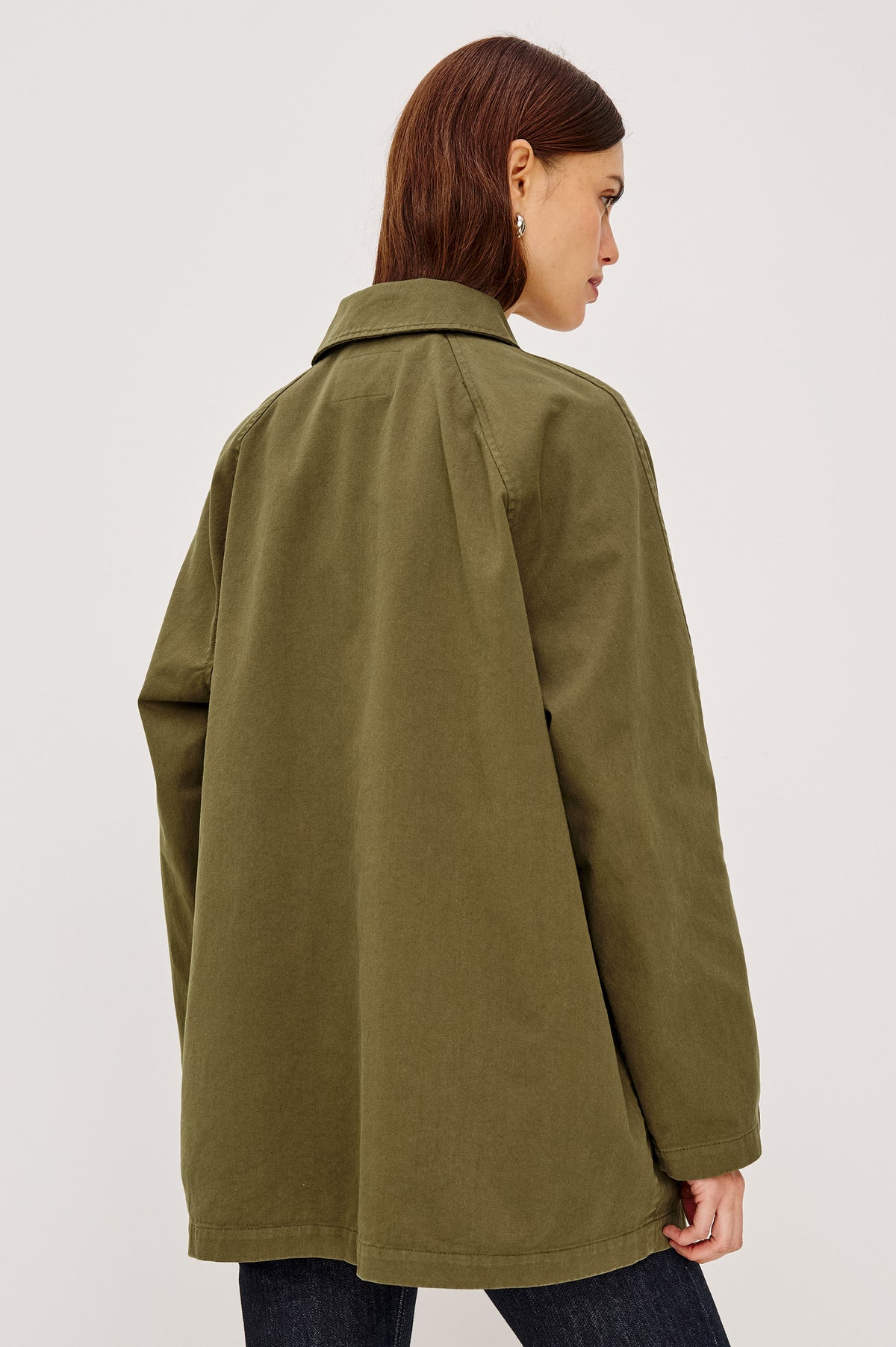 Stafford Jacket in Cotton Canvas With Relaxed Fit, Open Collar With Buttons for Funnel Neckline, Dual Patch Pockets, and Long Sleeves in Olive Colorway - Upper Body Back View Featured on Model