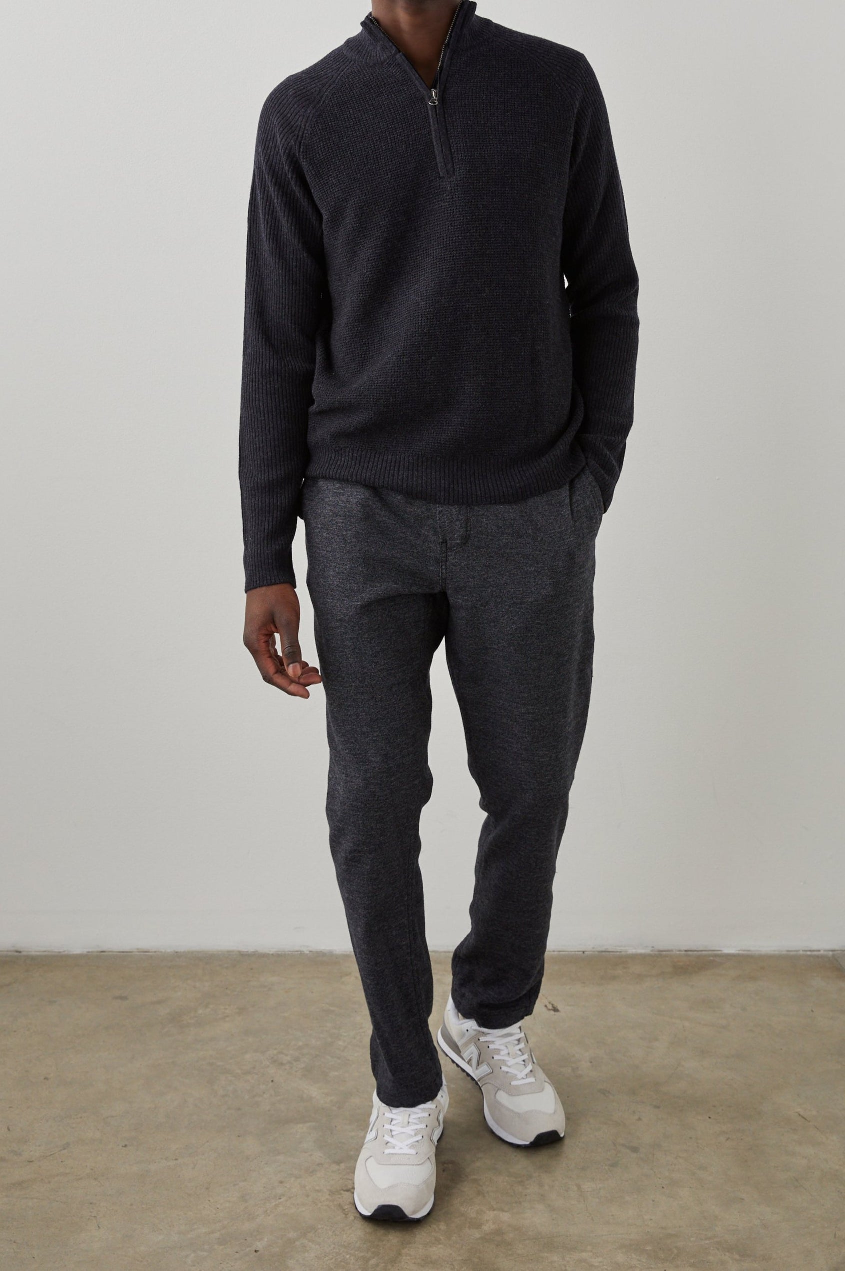 Stark Long-Sleeve Quarter Zip with a Mock Neck, Waffle Torso, and Ribbed Sleeves in Cast Iron Colorway - Front Full Body View Featured on Model
