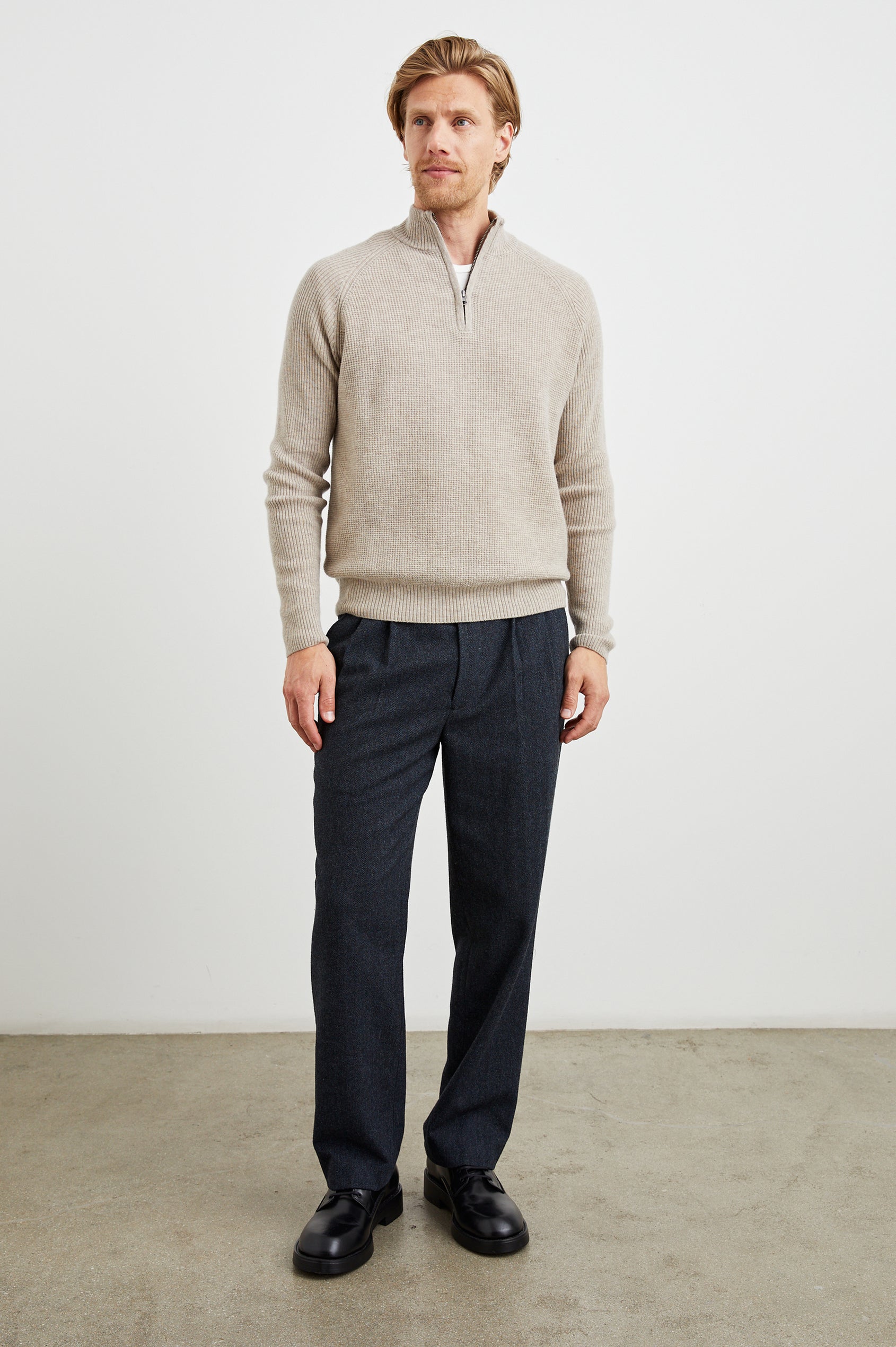 Stark Long-Sleeve Quarter Zip with a Mock Neck, Waffle Torso, and Ribbed Sleeves in Oat Melange Colorway - Front Full Body View Featured on Model