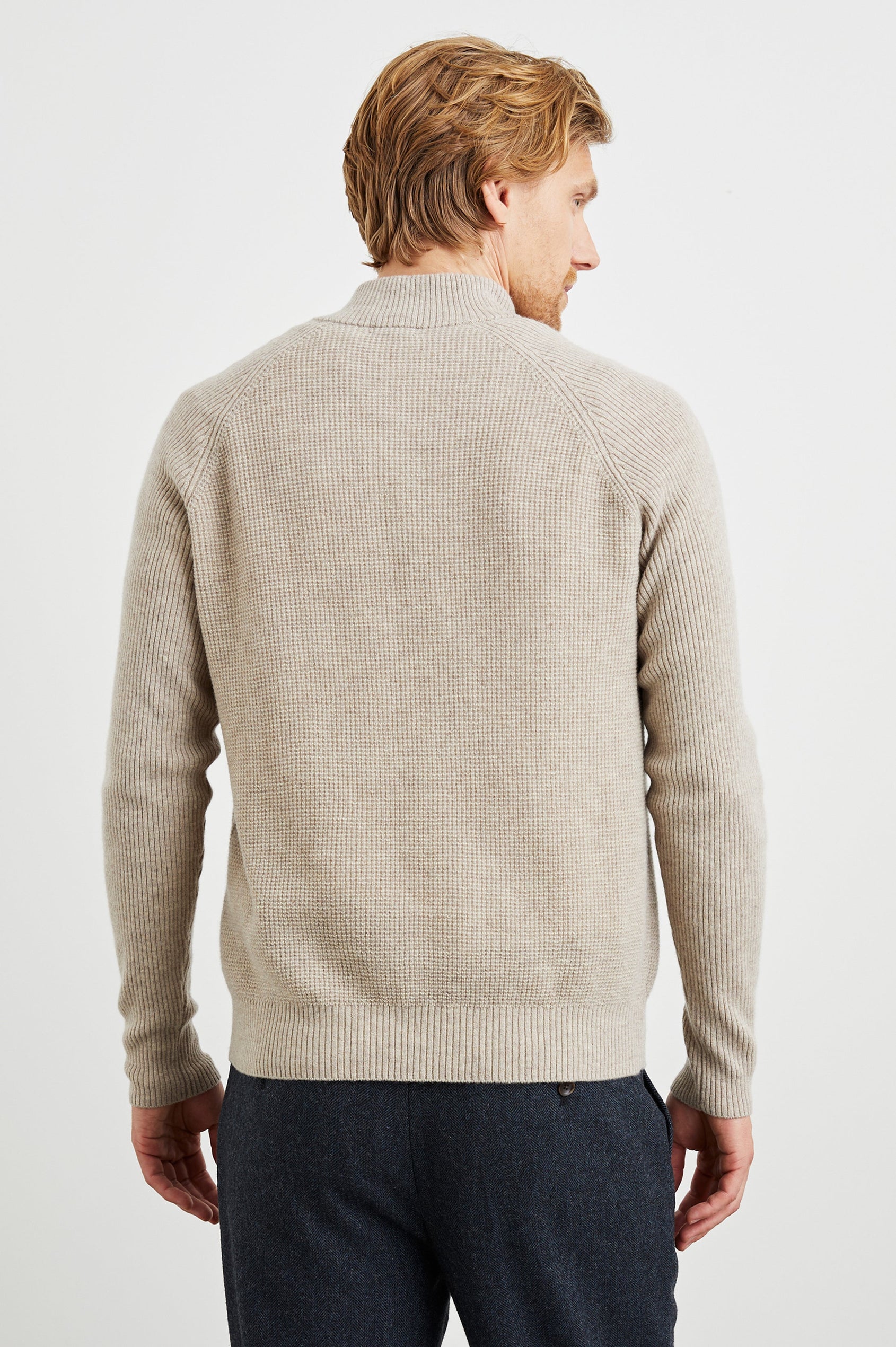 Stark Long-Sleeve Quarter Zip with a Mock Neck, Waffle Torso, and Ribbed Sleeves in Oat Melange Colorway - Back View Featured on Model