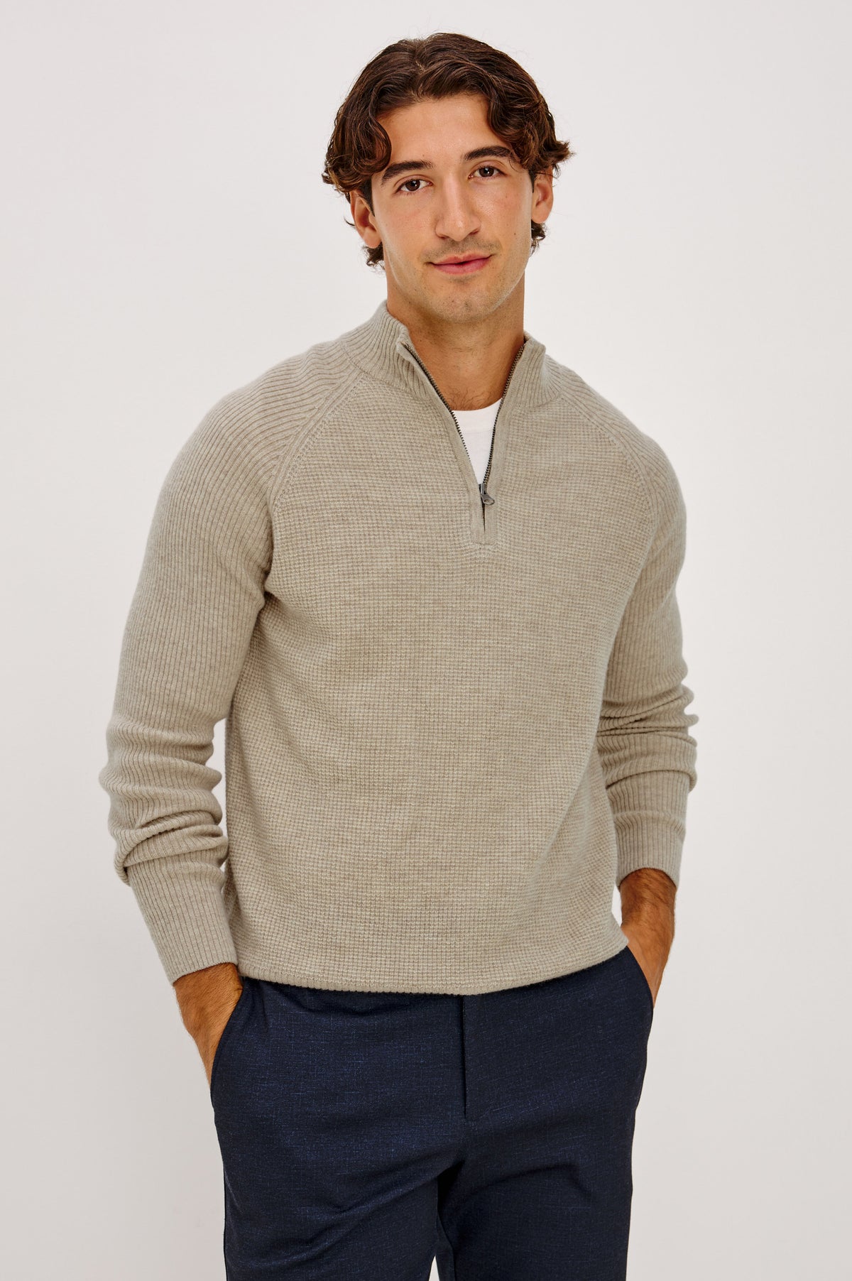 Stark Sweater in Waffle Knit With Quarter-Zip Placket, Mock Neck Collar, and Long Sleeves in Oat Melange Colorway - Upper Body Front View Featured on Model.