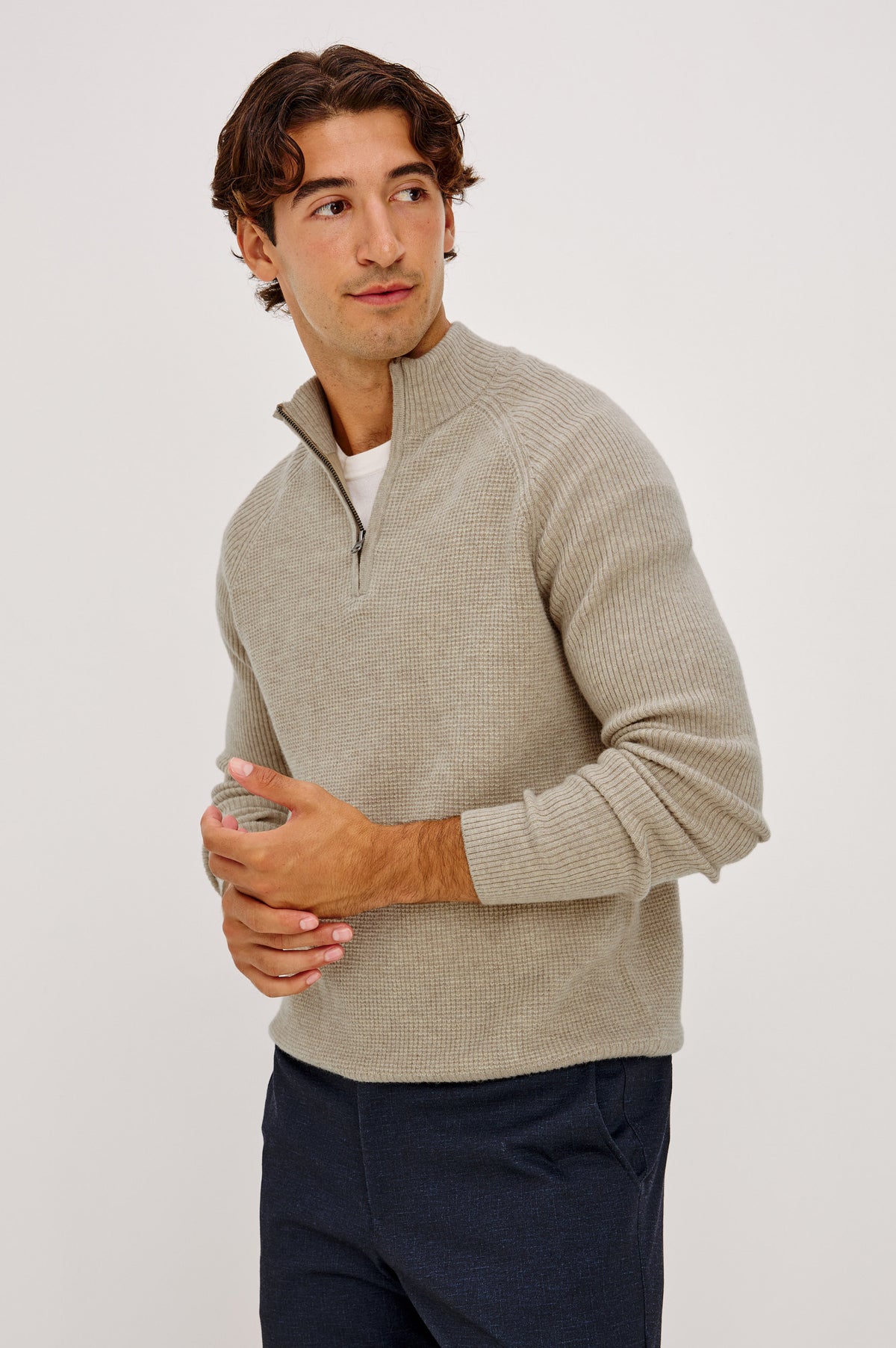 Stark Sweater in Waffle Knit With Quarter-Zip Placket, Mock Neck Collar, and Long Sleeves in Oat Melange Colorway - Front View Featured on Model.