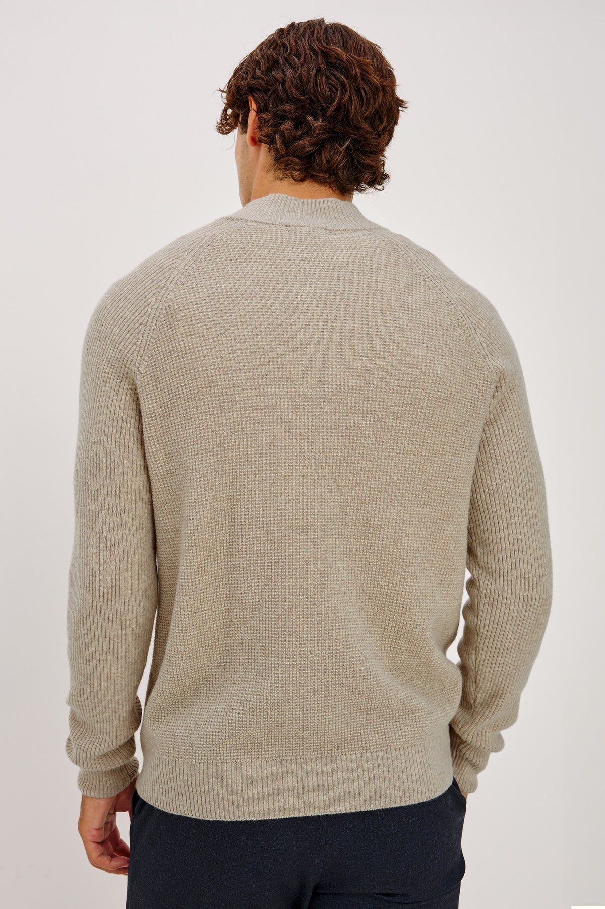 Stark Sweater in Waffle Knit With Quarter-Zip Placket, Mock Neck Collar, and Long Sleeves in Oat Melange Colorway - Upper Body Back View Featured on Model.