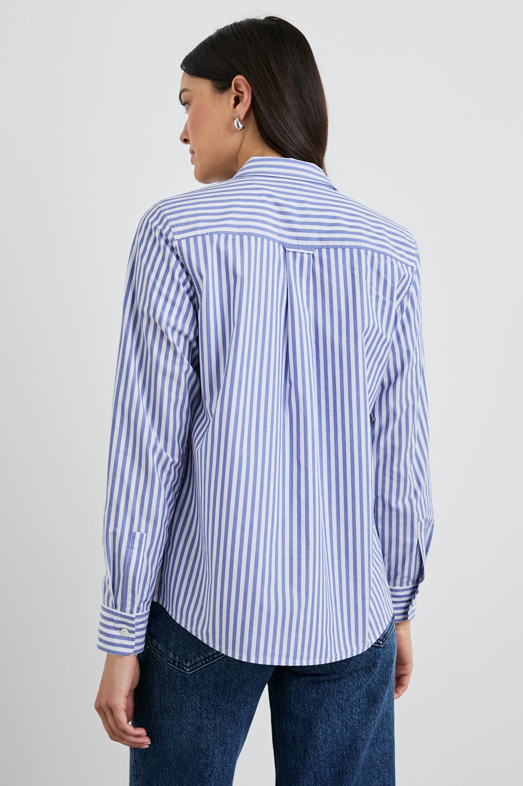 Stina Long-Sleeve Button Up with a Chest Patch Pocket in Mariner White Stripe Colorway, White and Blue Vertical Stripes - Back View Featured on Model