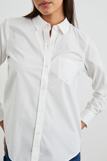 Stina Long-Sleeve Button Up with a Chest Patch Pocket in White Colorway - Front View Featured on Model