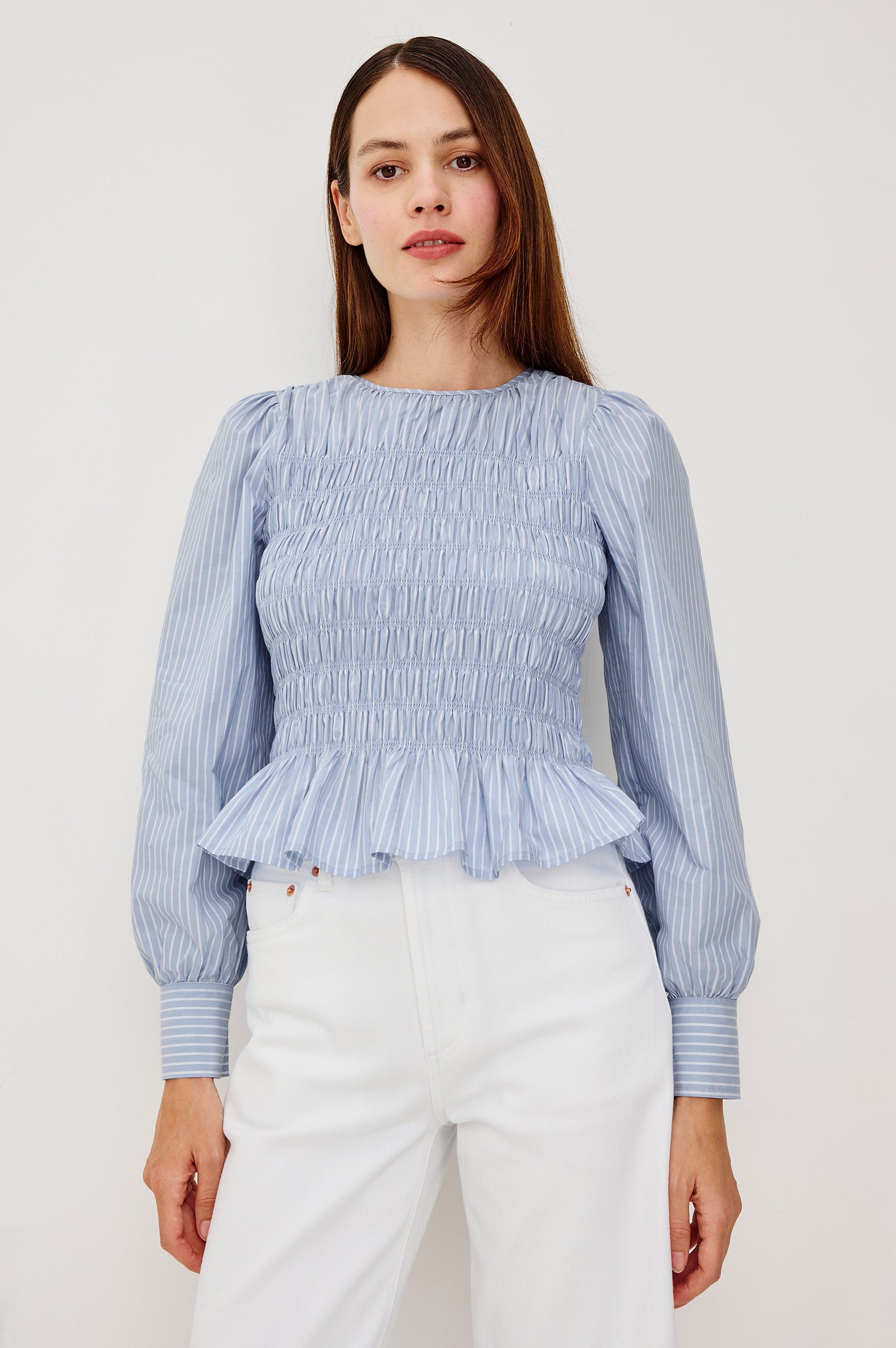 Tabi Blouse Top in Poplin With Smocked Body Long Puff Sleeves With Fitted Cuffs Contrast Embroidered Detailing and Back Keyhole Cutout in White Stripe Colorway - Full Body Front View Featured on Model