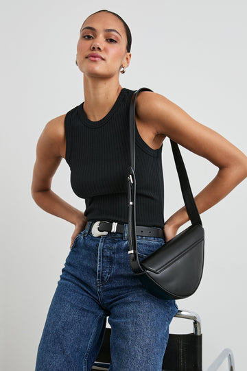 The Racer Ribbed Tank with a Crew Neckline in True Black Colorway - Front View Featured on Model