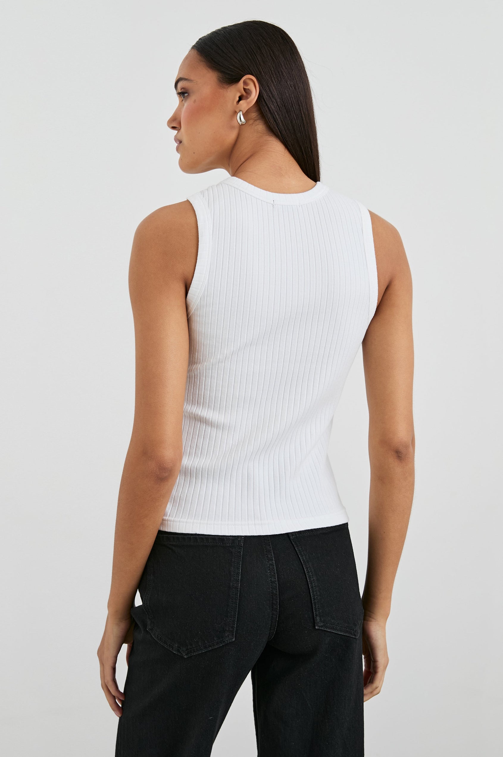 The Racer Ribbed Tank with a Crew Neckline in White Colorway - Back View Featured on Model
