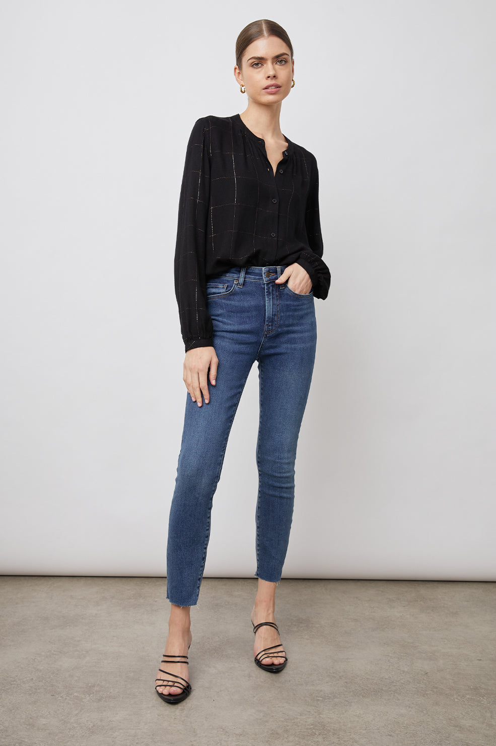 Eloise Long-Sleeve Button Up with an Open Collar in Ebony Tinsel Colorway, a plaid - Front Tucked Full Body View Featured on Model