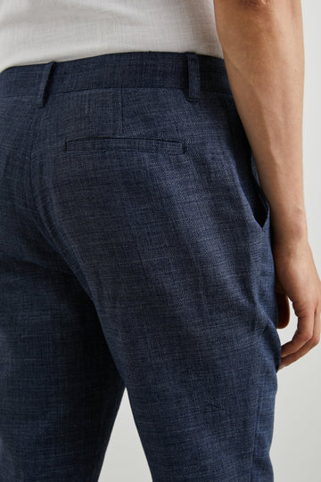 Thomas Pants with Two Front Pockets, Two Back Welt Pockets and Belt Loops in Navy Melange Colorway - Back View Featured on Model