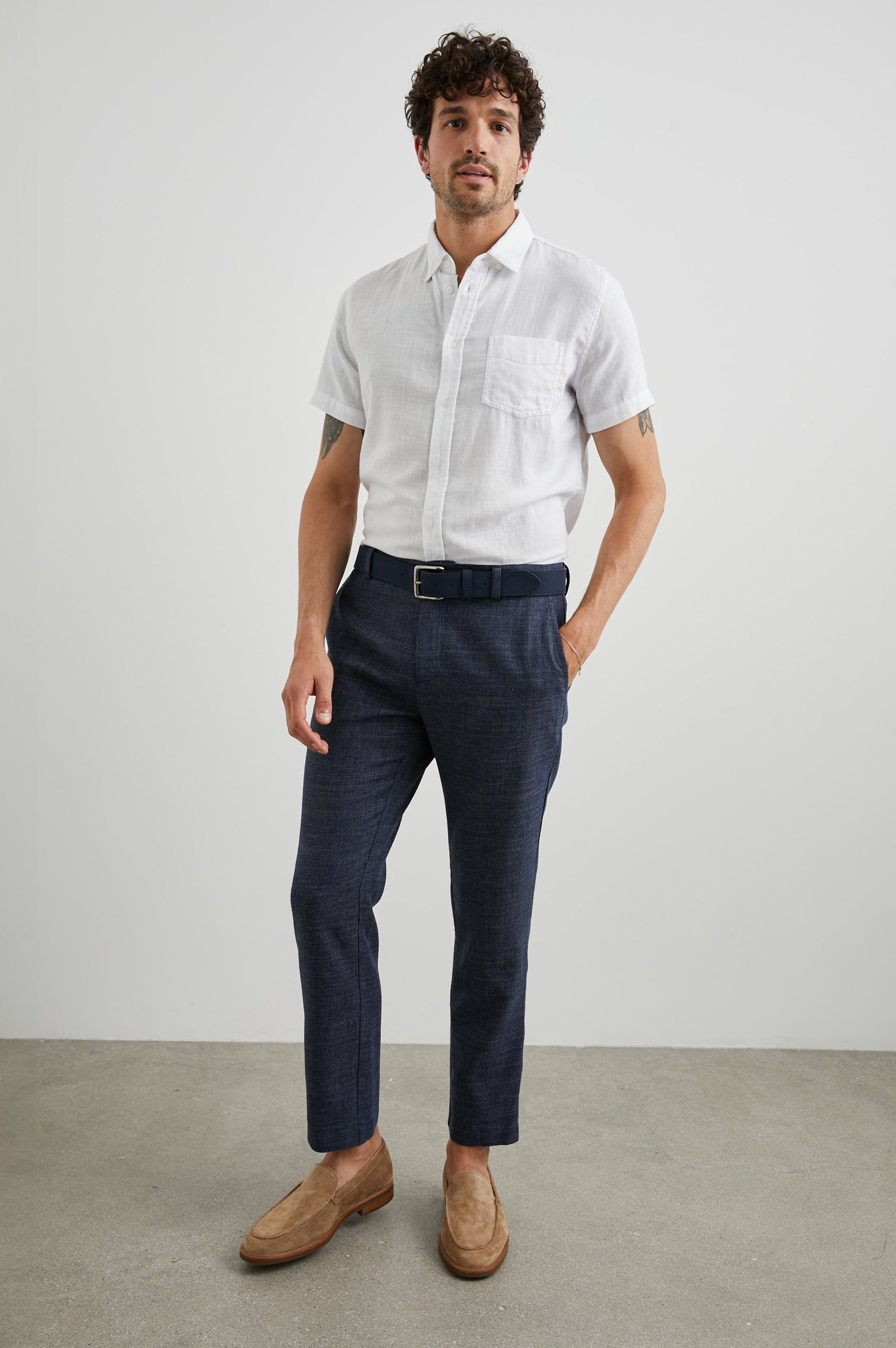 Thomas Pants with Two Front Pockets, Two Back Welt Pockets and Belt Loops in Navy Melange Colorway - Front Full Body View Featured on Model