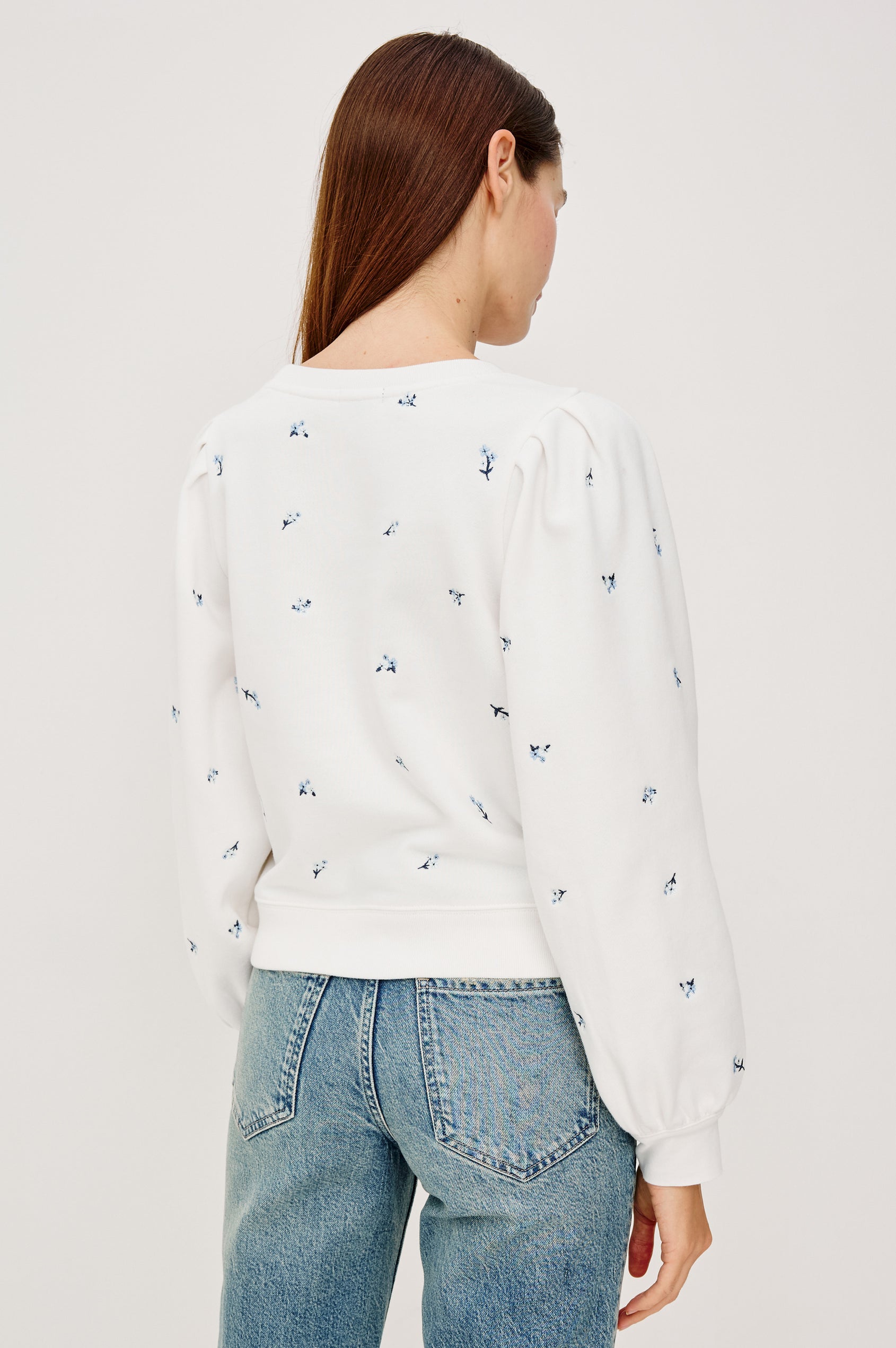 Tiffany Crewneck Sweatshirt in French Terry With Contrast Floral Embroidery, Long Puff Sleeves With Fitted Cuffs, and Ribbed Trim in Blue Iris Colorway - Upper Body Back View Featured on Model