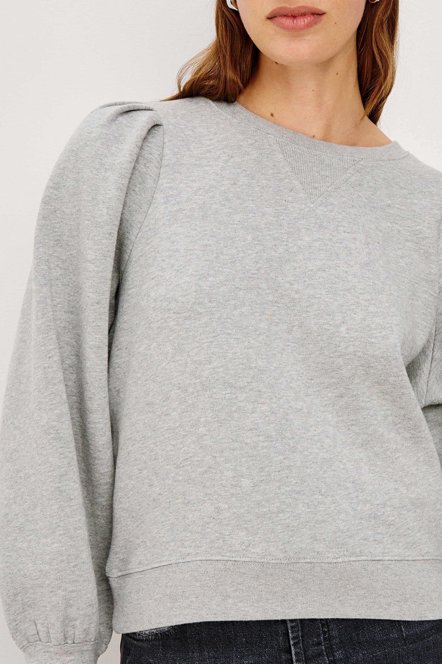 Tiffany Long-Sleeve Sweatshirt with a Crew Neck and Deep Pleated Sleeves in Heather Grey Colorway - Close up of details Featured on Model