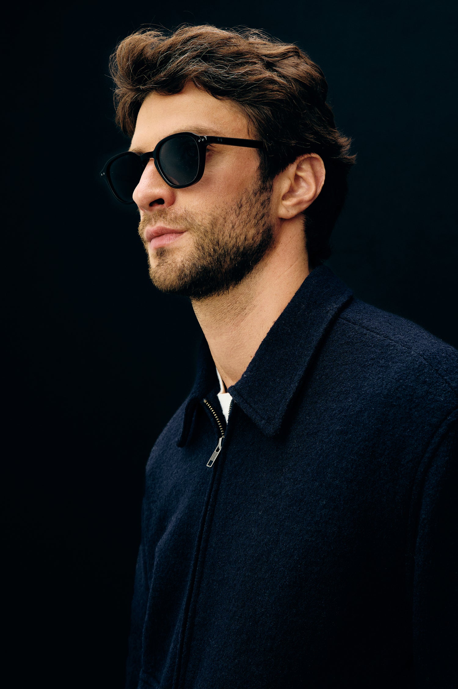 Tillman Front Zip Jacket With Collar, Buttoned Pockets With Top and Side Entry, and Long Sleeves in Navy Boucle Colorway - Side Portrait Close Up View Featured on Model